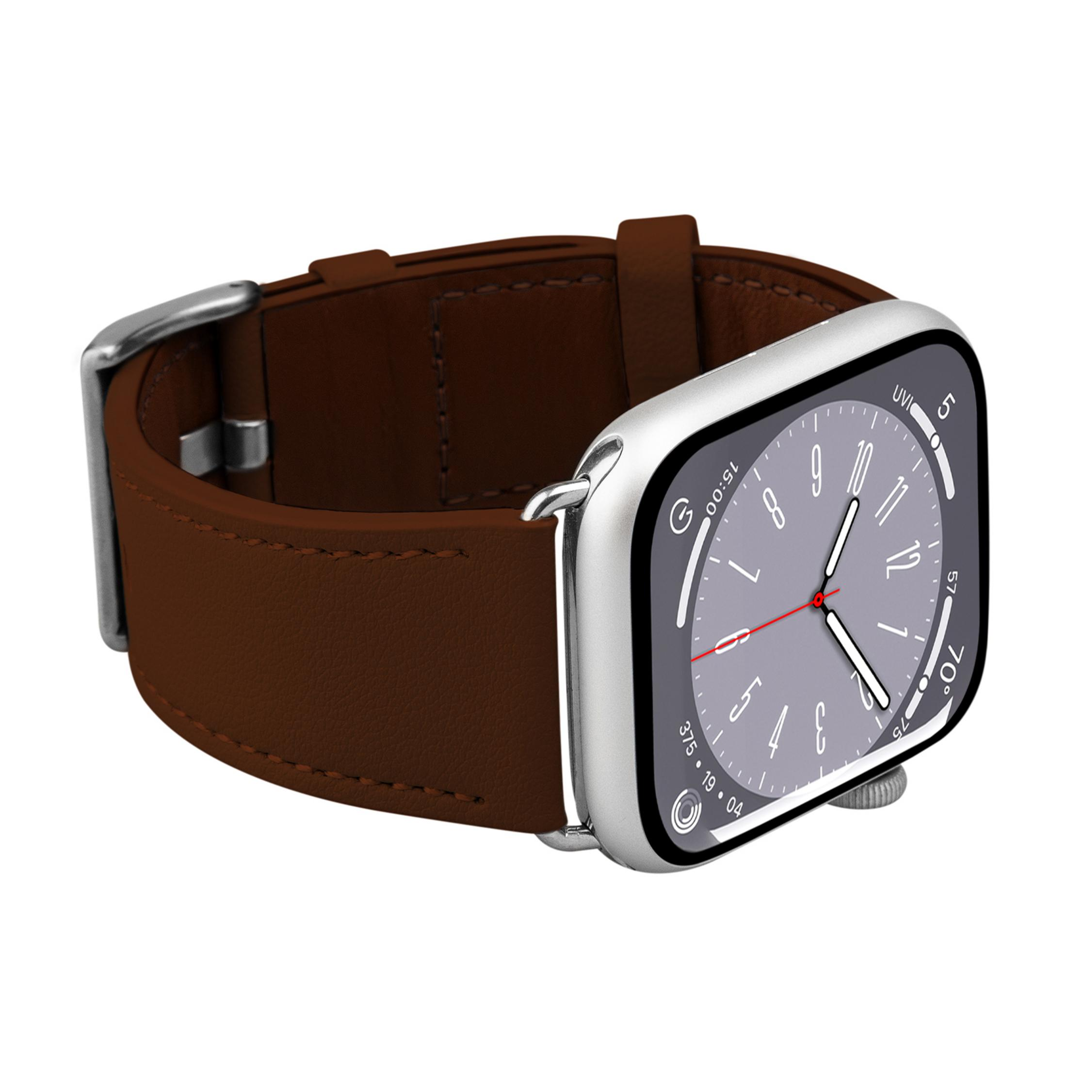Smartwatch argentato con cinturino in pelle marrone che mostra le 15:00.