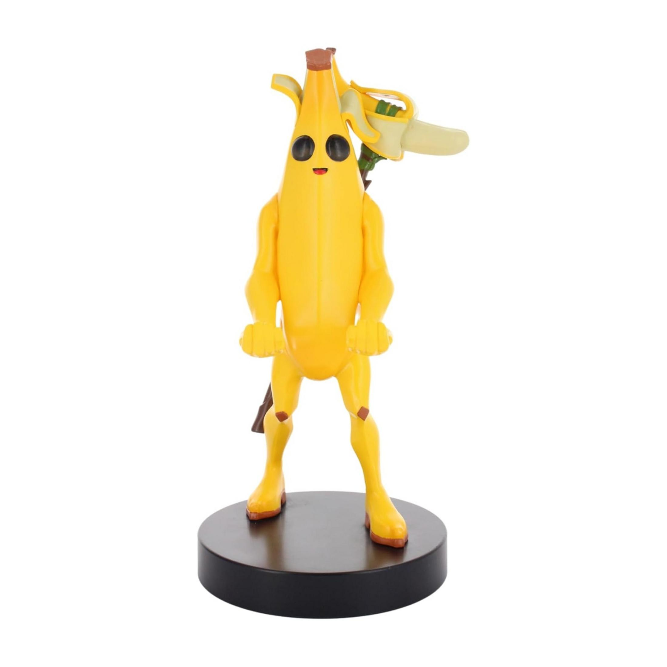 Una figura a cartone animato gialla a forma di banana su una base nera.