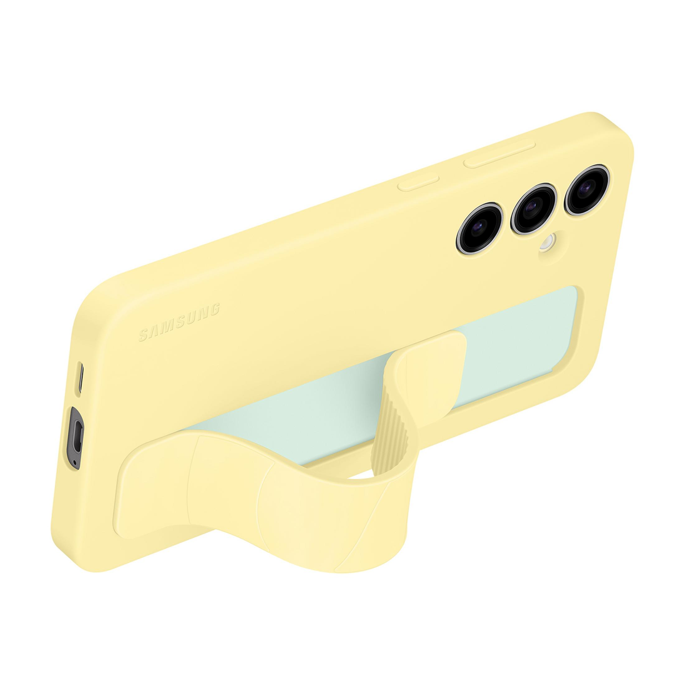 Żółte etui Samsung z podstawką i trzema obiektywami aparatu.