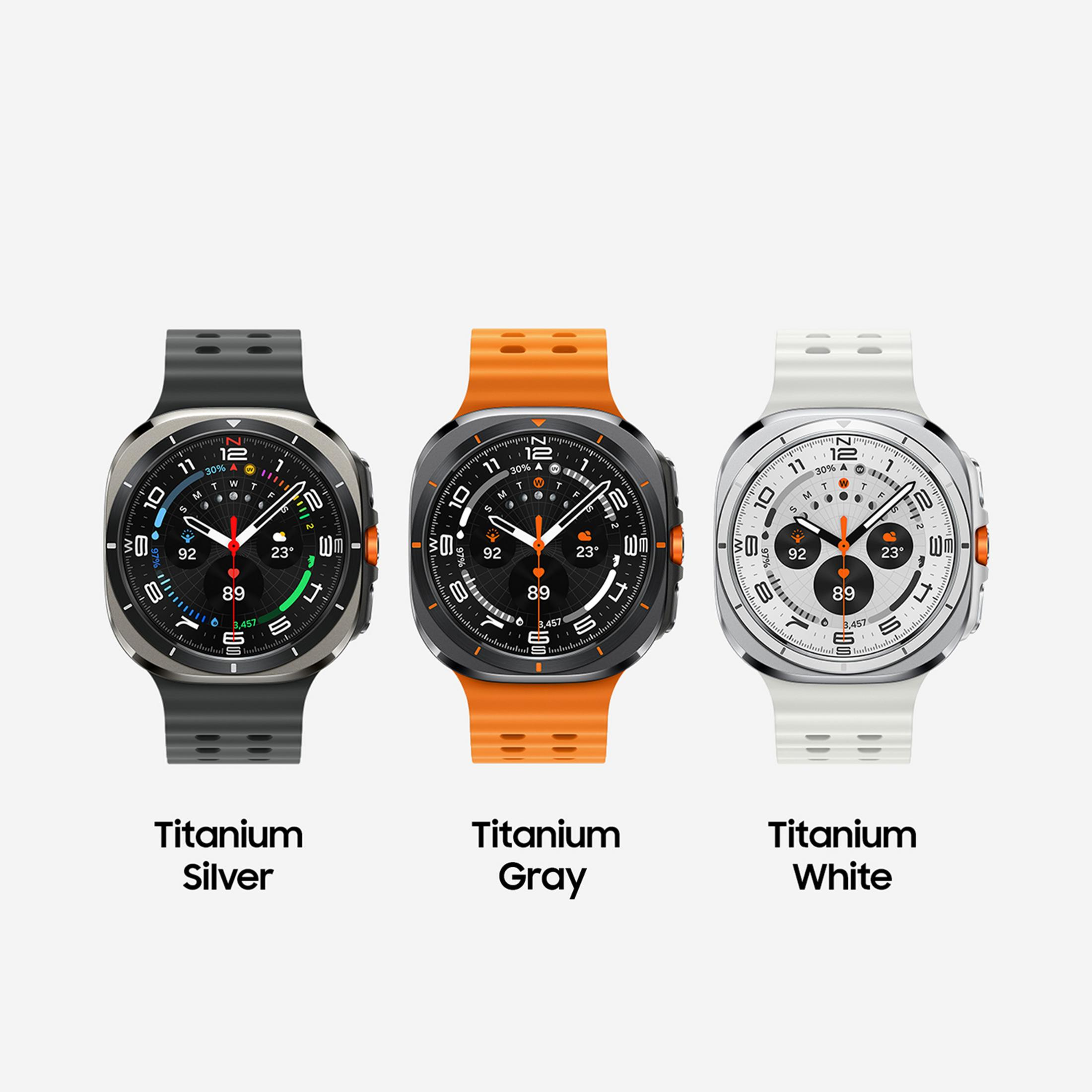 Tre smartwatch uno accanto all'altro: argento, arancione e bianco.