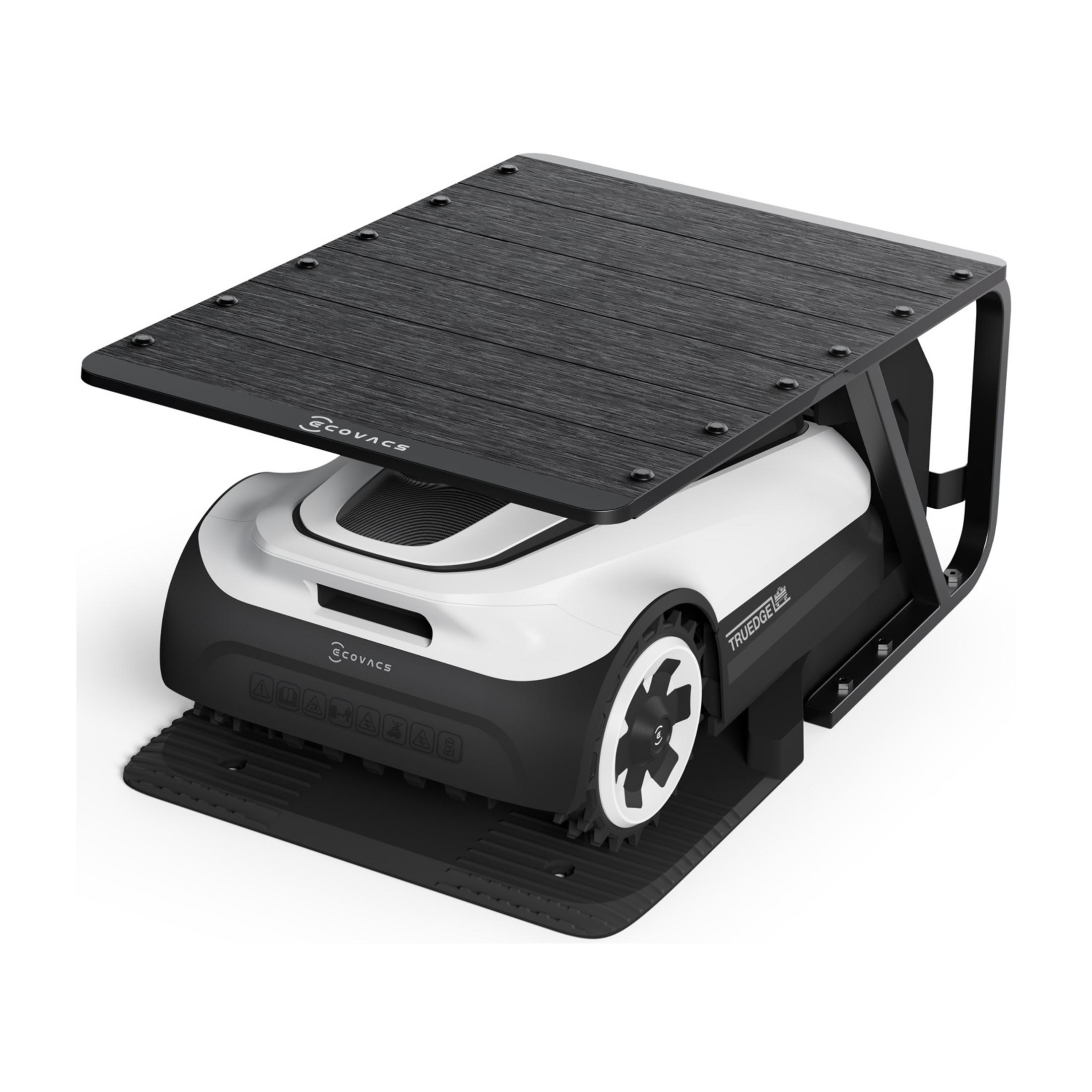 Un tosaerba robotizzato bianco con parte superiore e ruote nere.