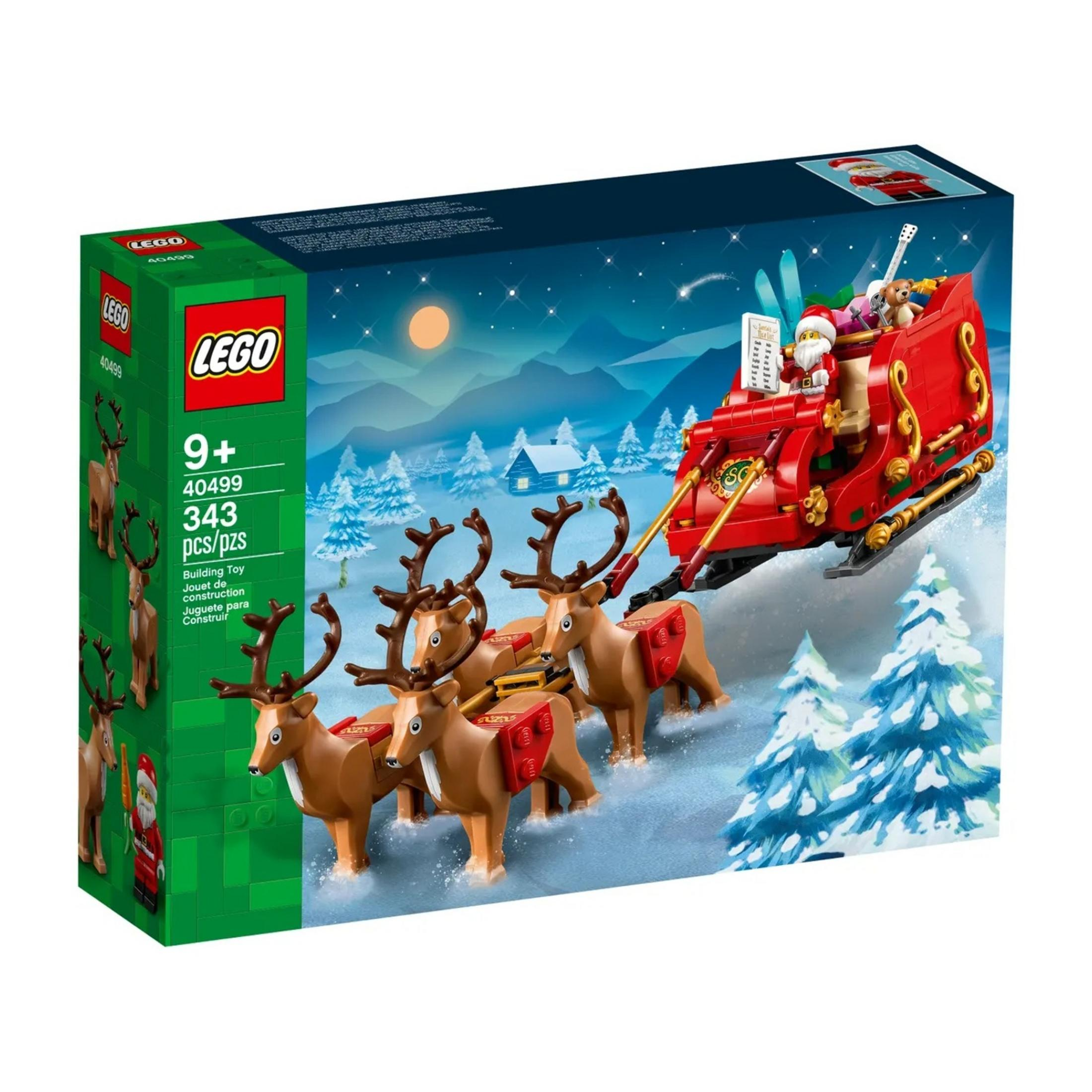 LEGO Weihnachtsschlitten mit Rentieren und Nikolaus im Schnee.