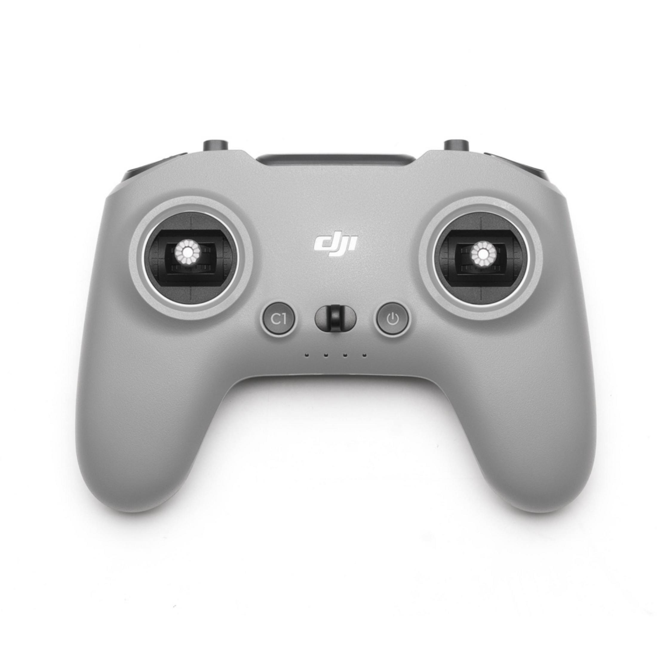 Controller DJI grigio con due joystick, pulsanti e spie luminose.