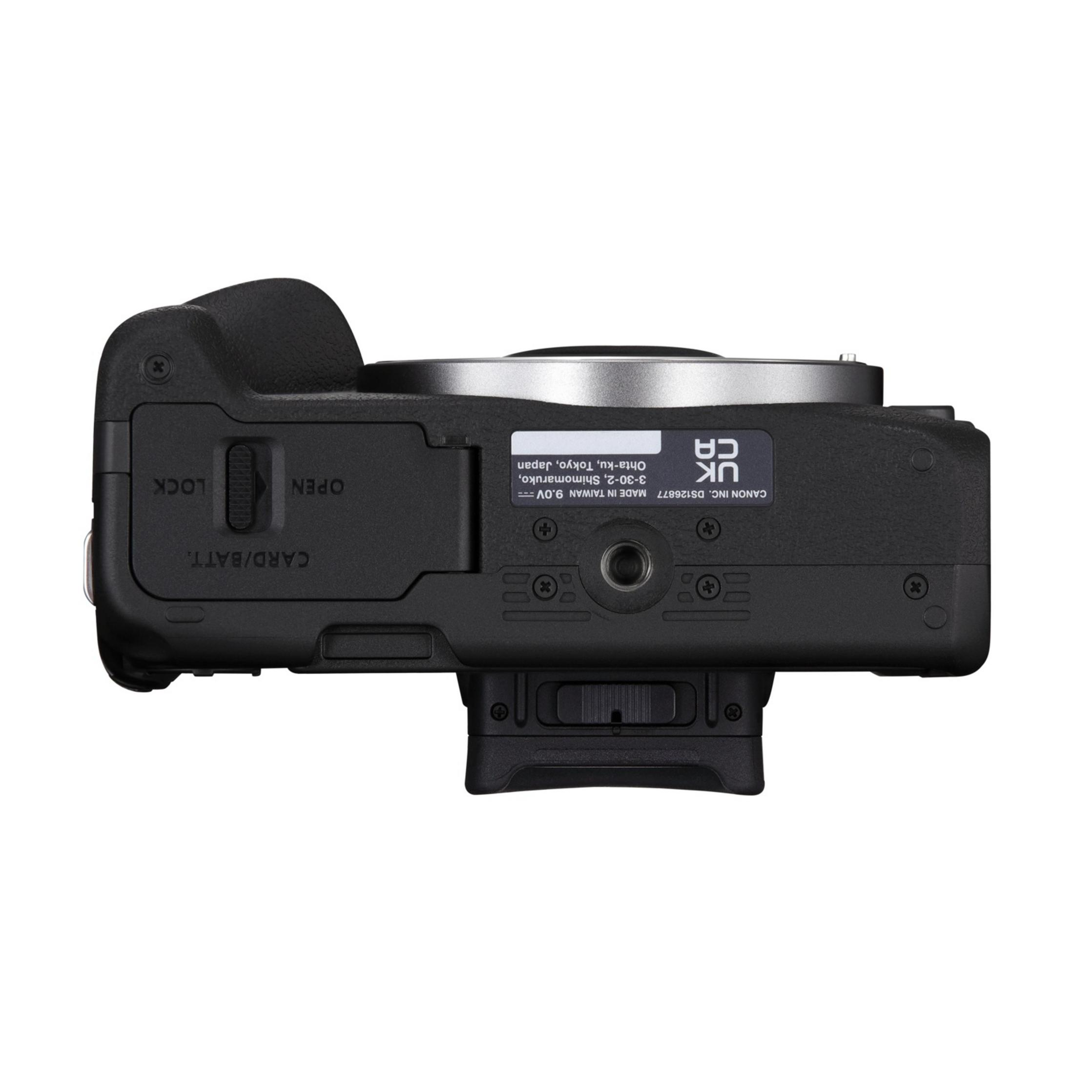 Black camera view: Battery compartment with lock and open mechanism.