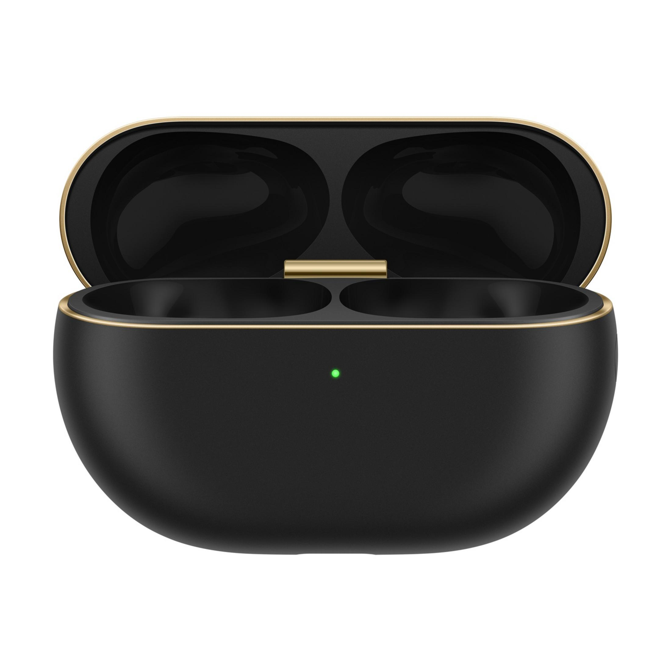 Czarne etui ładujące ze złotym wykończeniem i zieloną diodą.