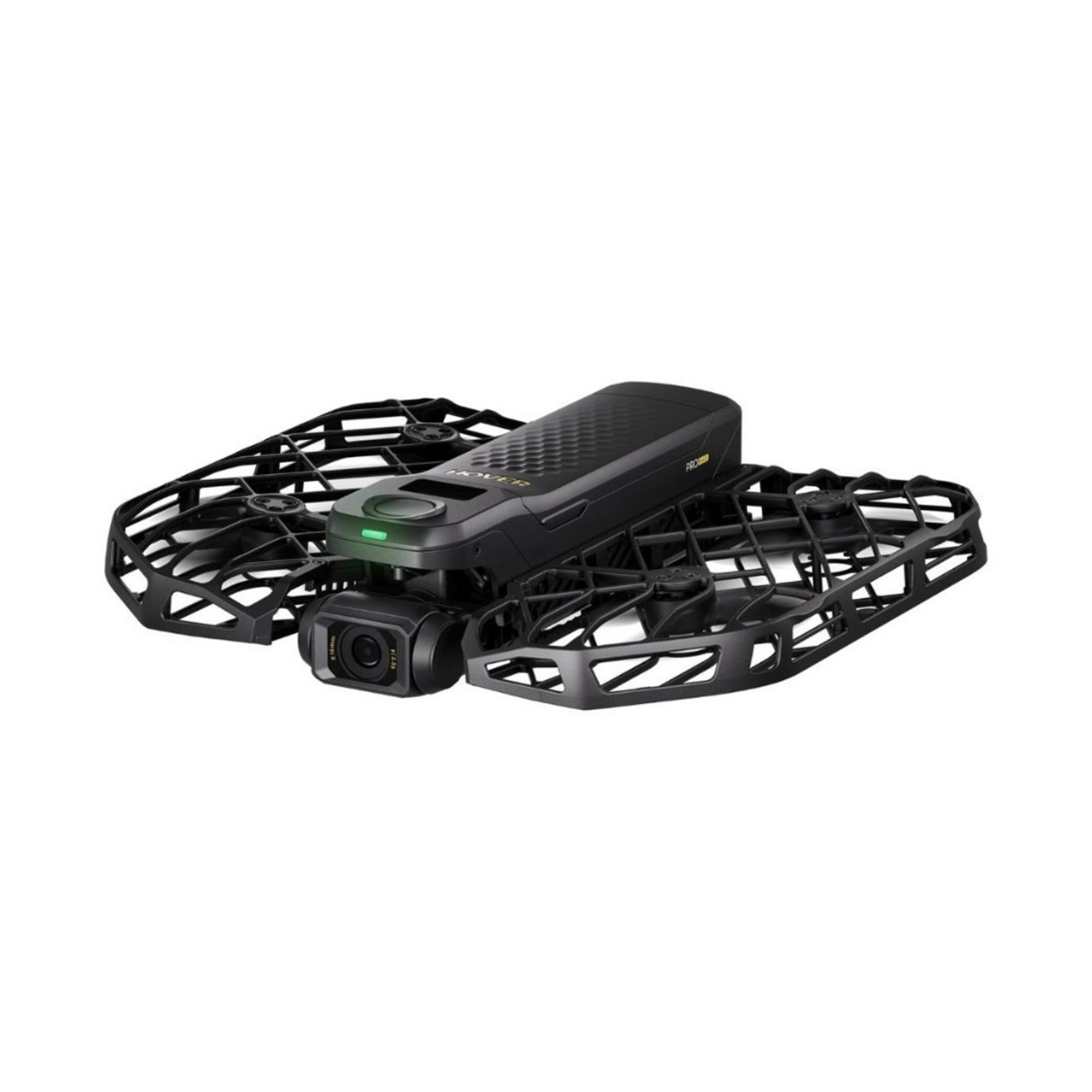 Czarna mini-dron z kamerą i osłonami śmigieł, na białym tle.