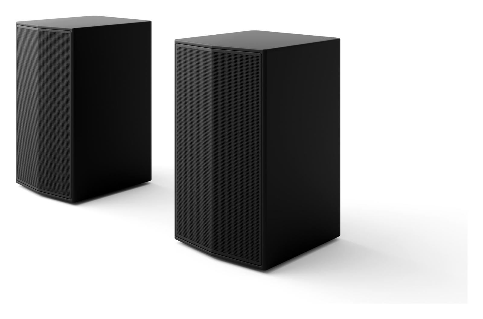 Dwa czarne głośniki stoją obok siebie na białym tle.
