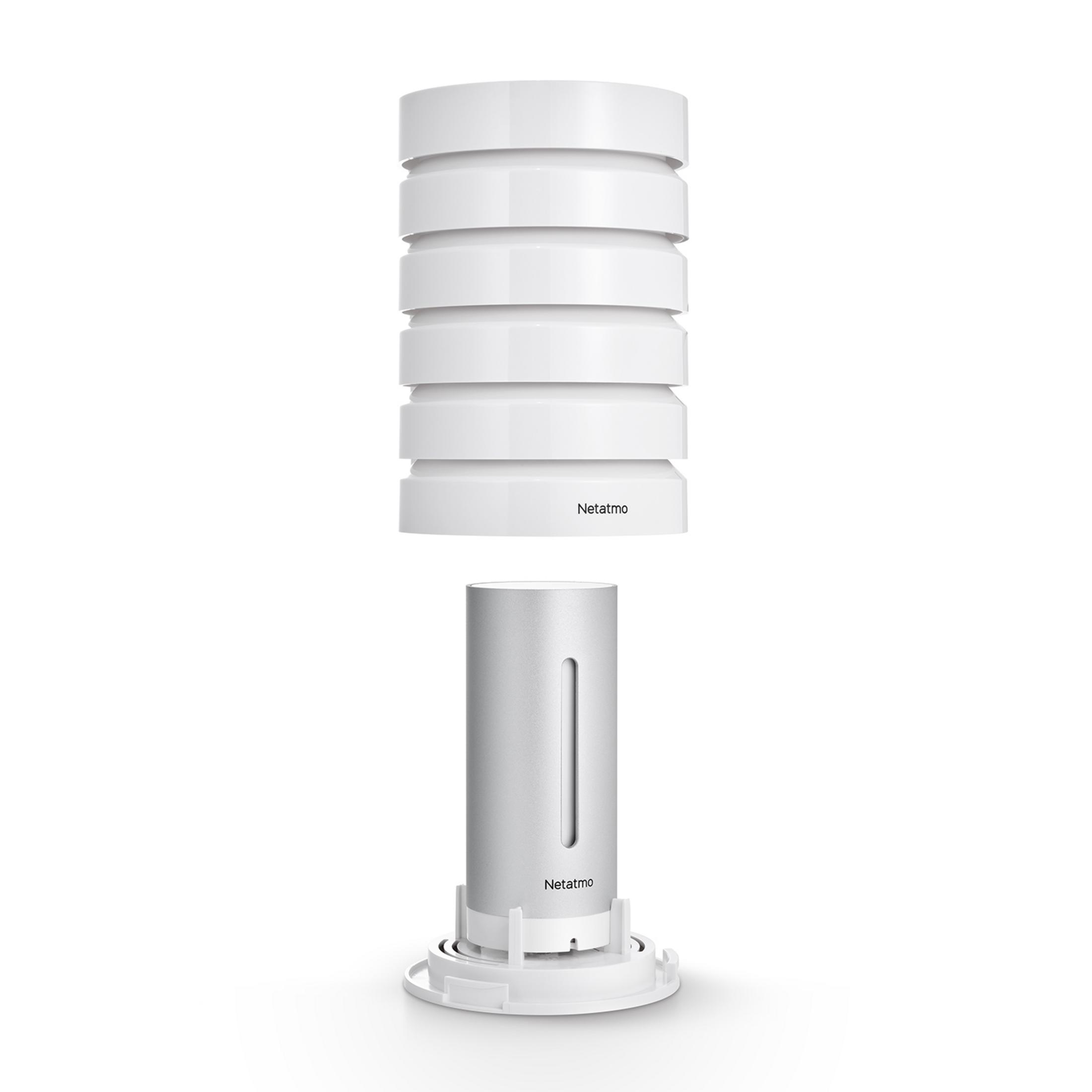 White and silver weather station components on a white background.