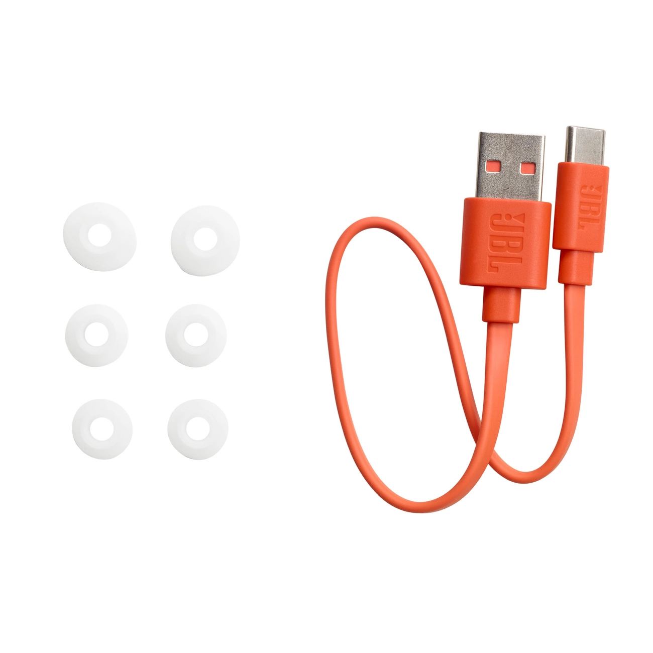 Sześć białych końcówek do słuchawek i pomarańczowy kabel JBL USB-A do USB-C.