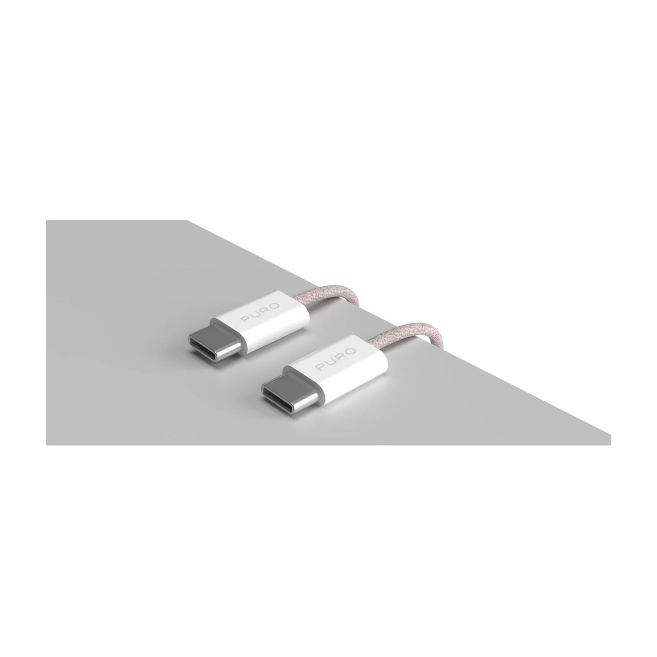 Zwei weiße Puro-USB-C-Kabel mit geflochtenem Textilmantel liegen auf grauem Untergrund.