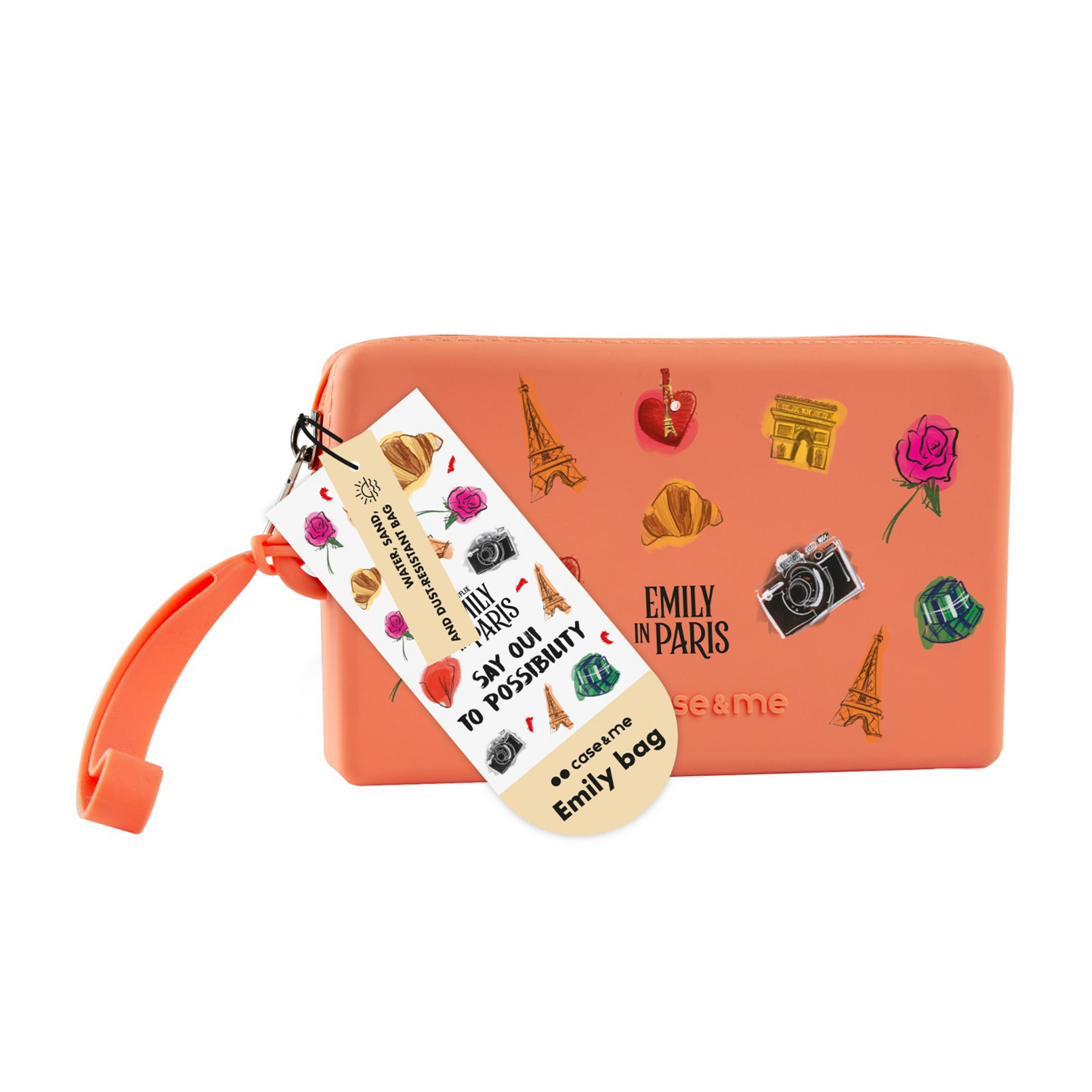 Una bolsa naranja adornada con motivos de París y un asa.