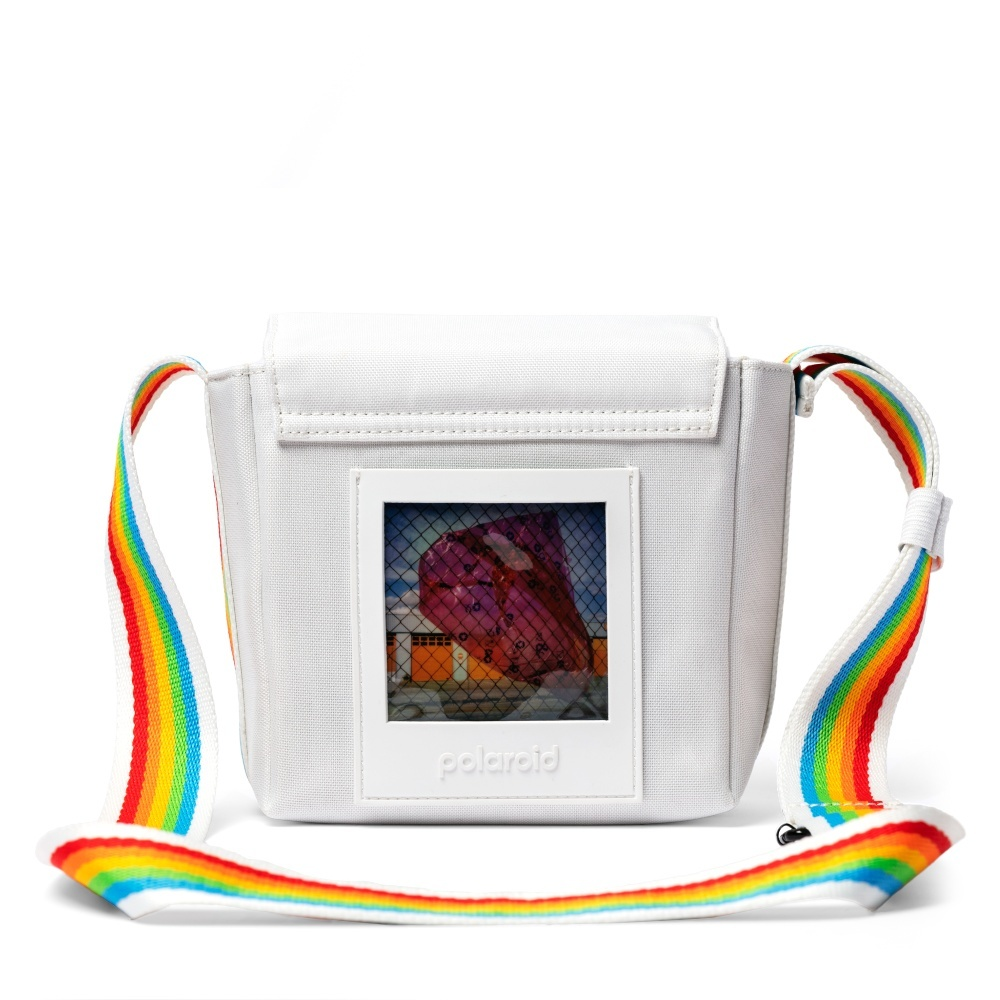 Weiße Polaroid Tasche mit Regenbogen-Träger und Foto-Fenster.