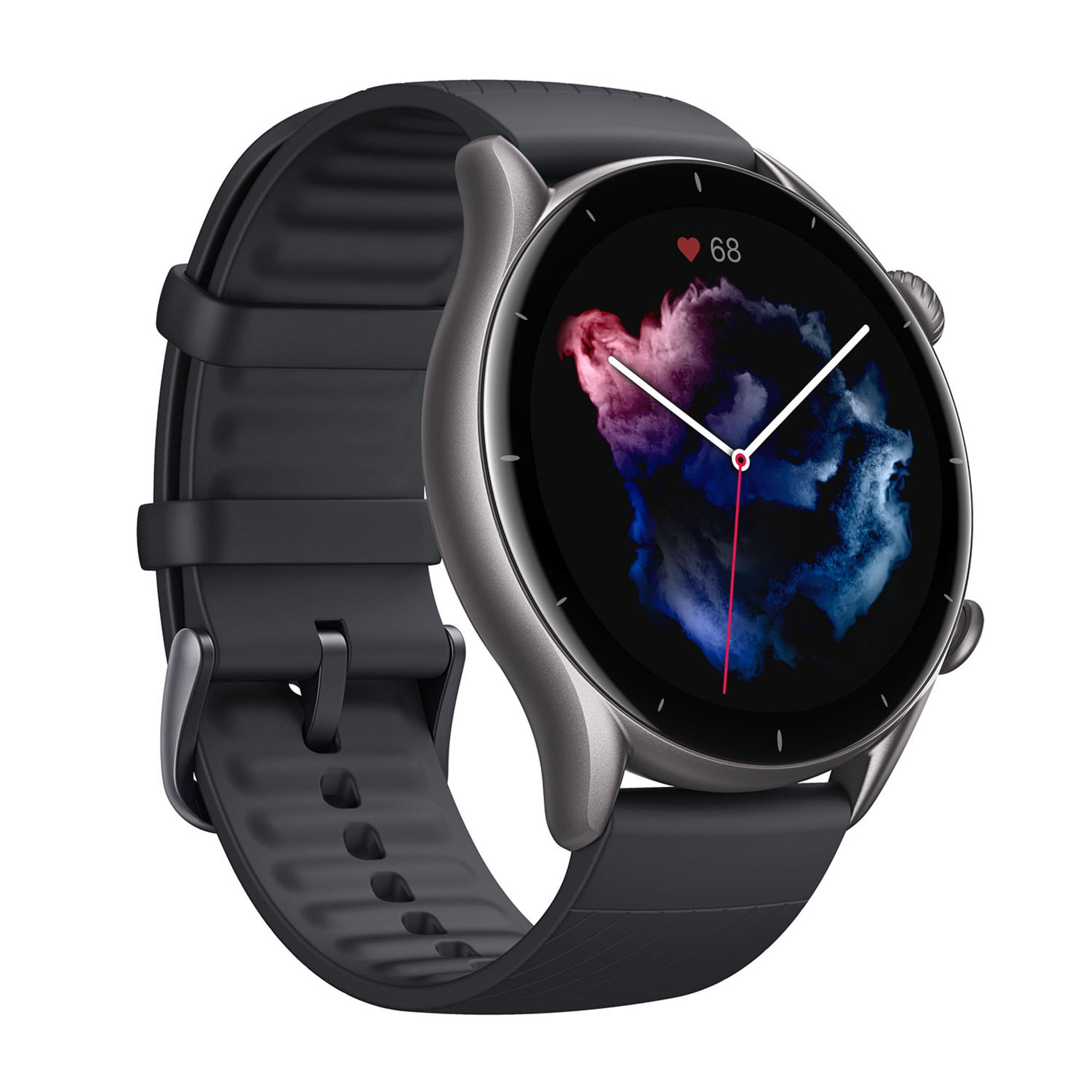 Smartwatch grigio con cinturino nero e quadrante astratto.