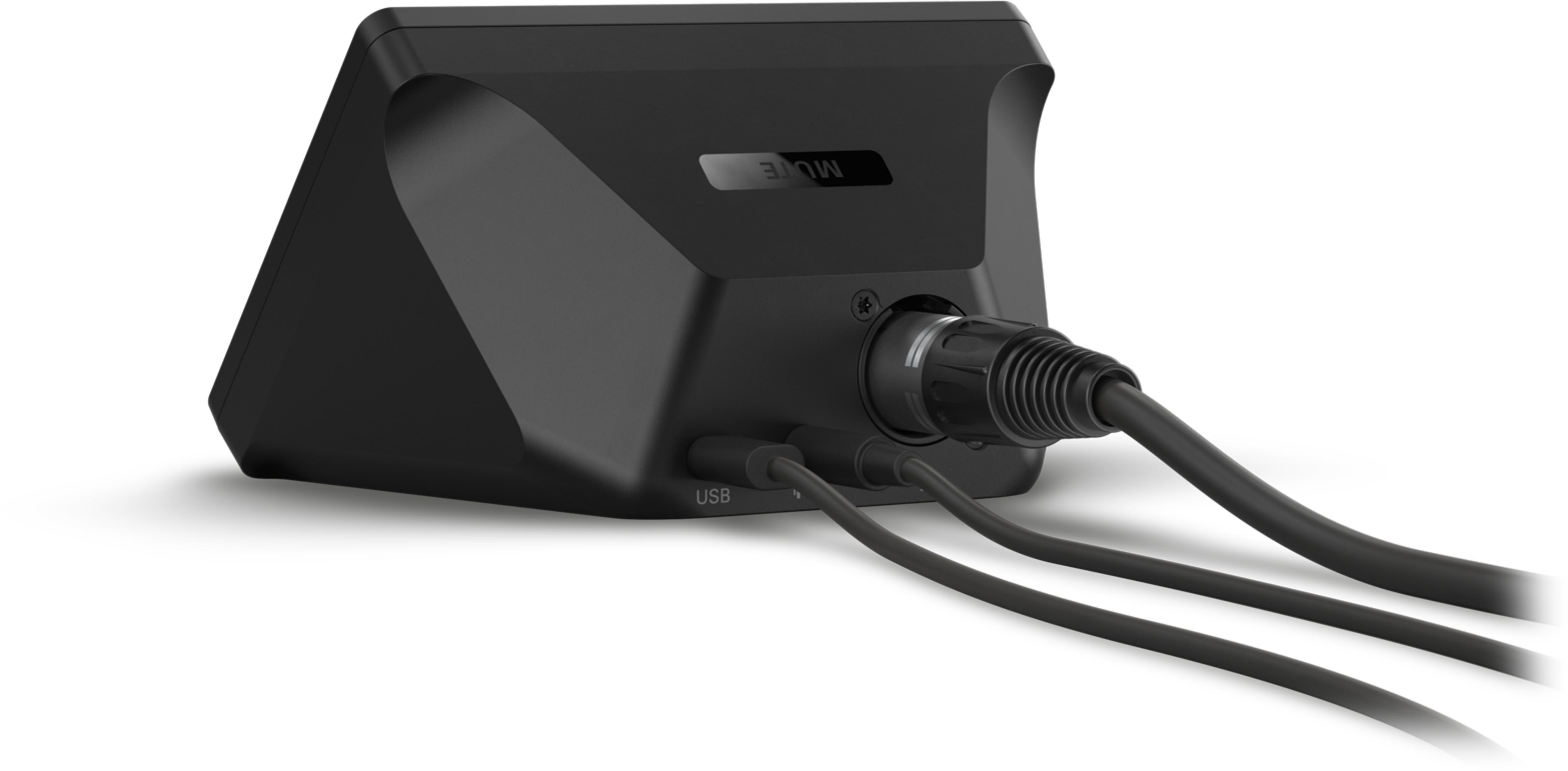 Dispositivo nero con cavi, porta USB ed etichetta MUTE.