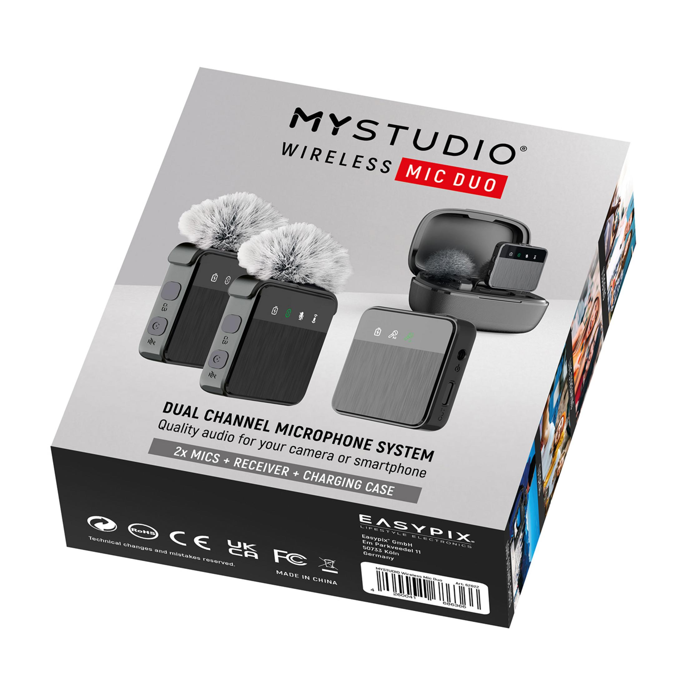 Packung eines drahtlosen Mikrofonsystems mit zwei Mikrofonen, einem Empfänger und einer Ladestation.