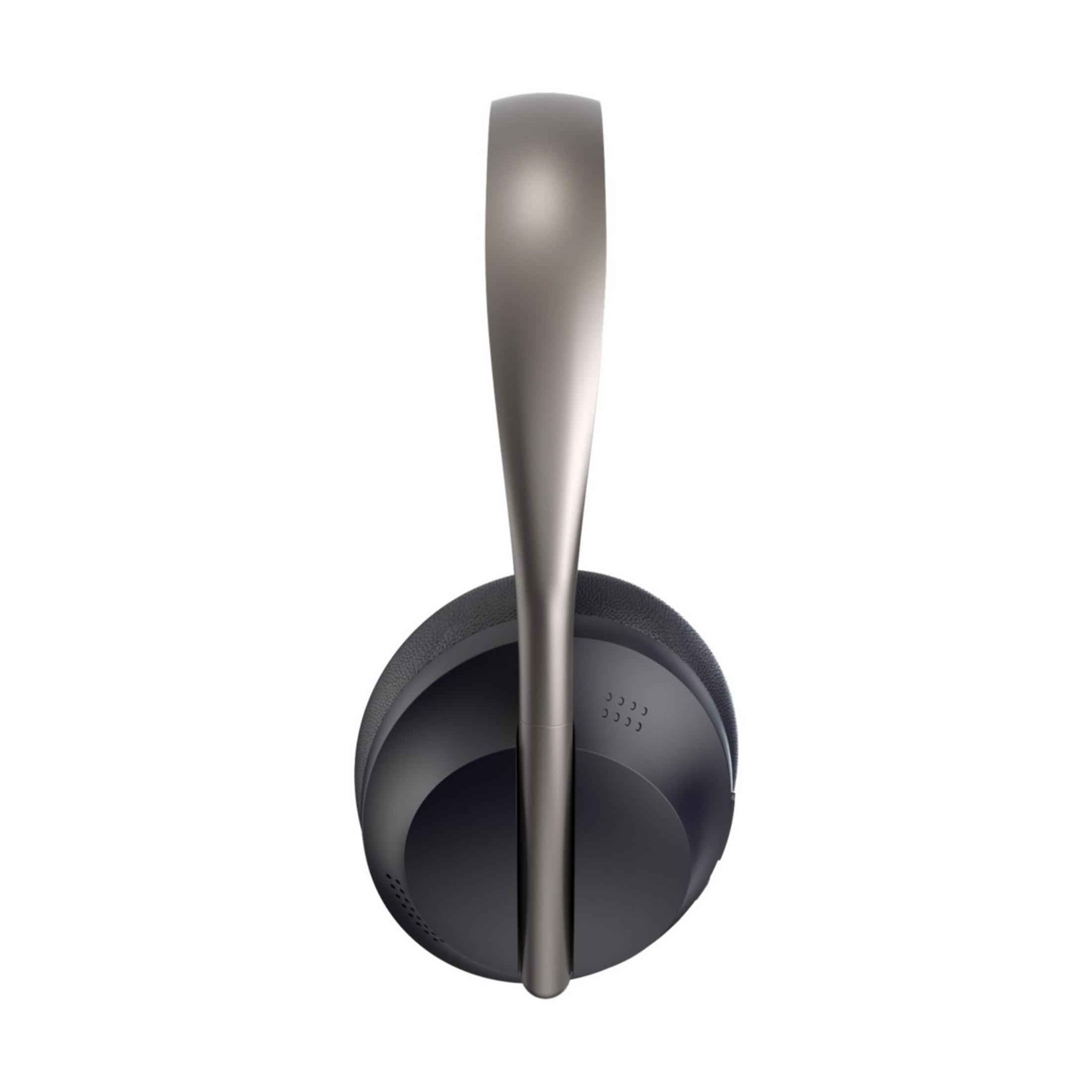 Auriculares grises con almohadilla negra, vistos desde arriba.