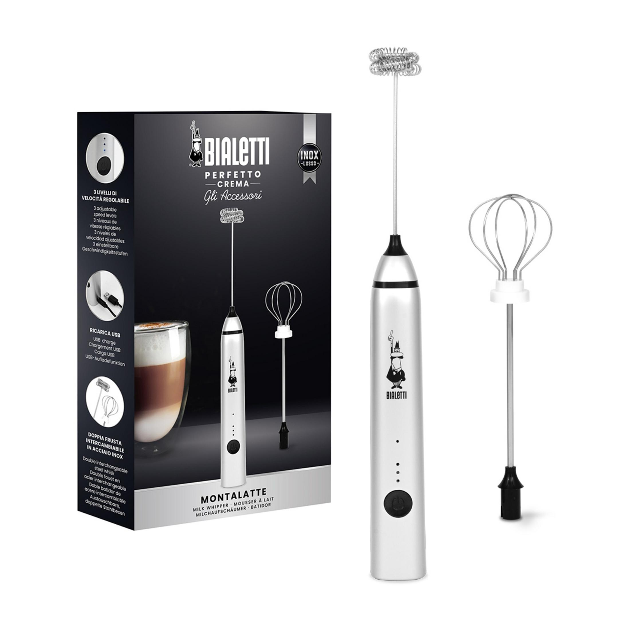A silver milk frother with two attachments and packaging.