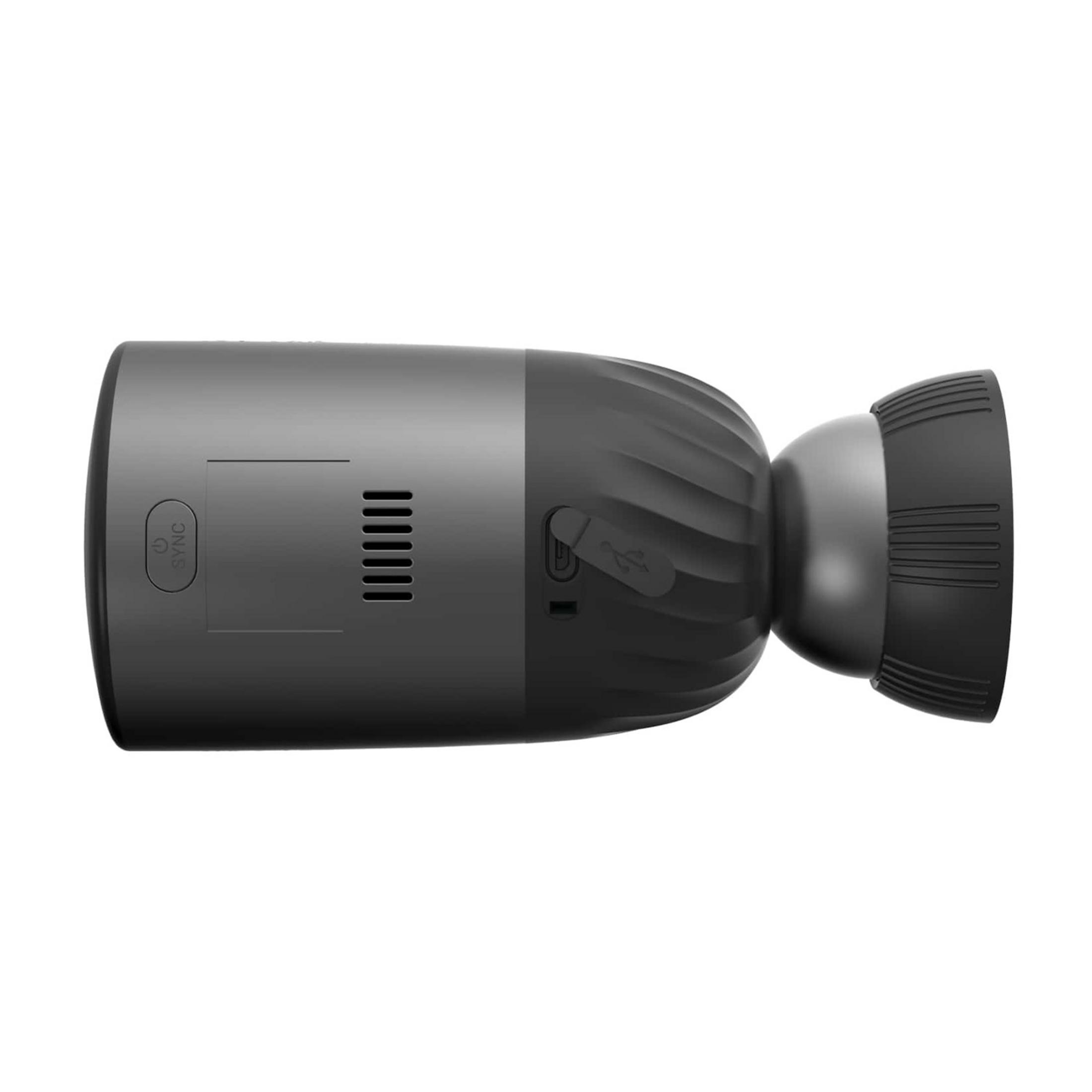 Czarny, cylindryczny, ząbkowany gadżet z portem USB.