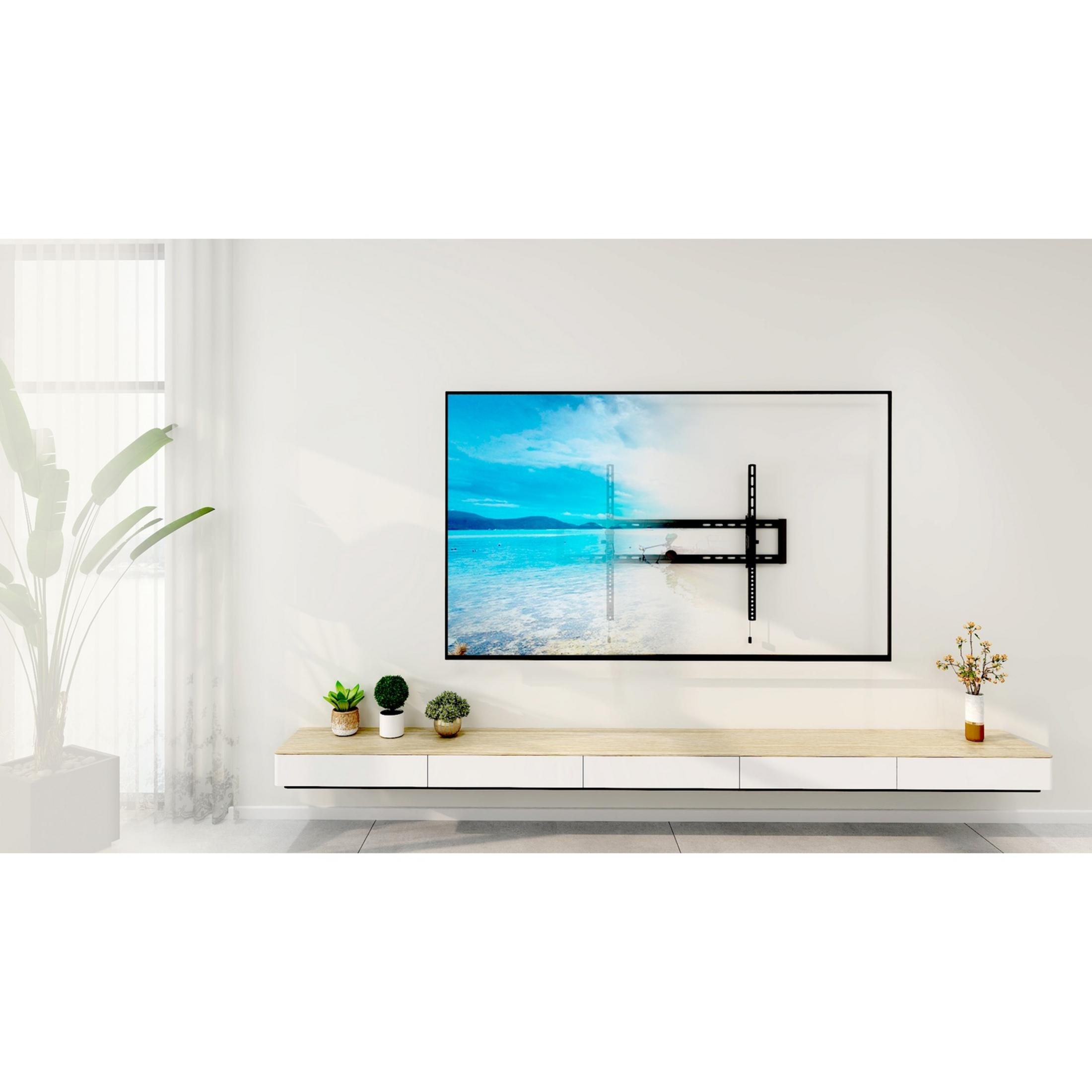 Ein schwarzer TV-Wandhalter an einer weißen Wand über einem schwebenden TV-Schrank.