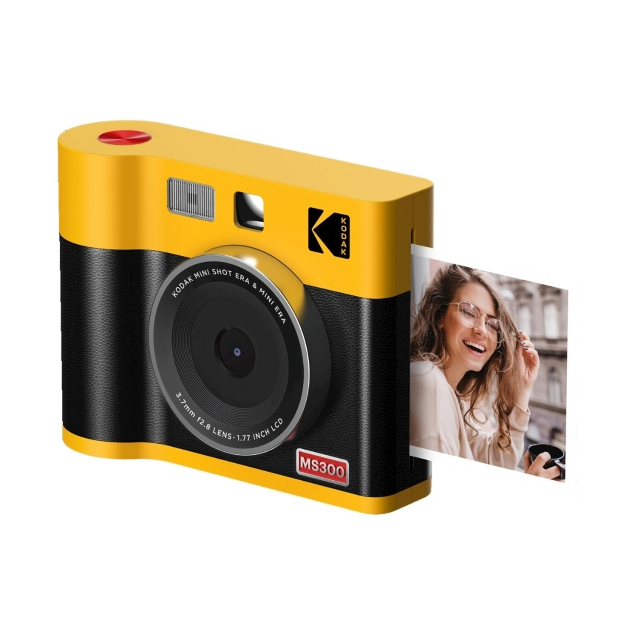 Fotocamera Kodak gialla con impugnatura nera, stampa una foto di una donna sorridente.