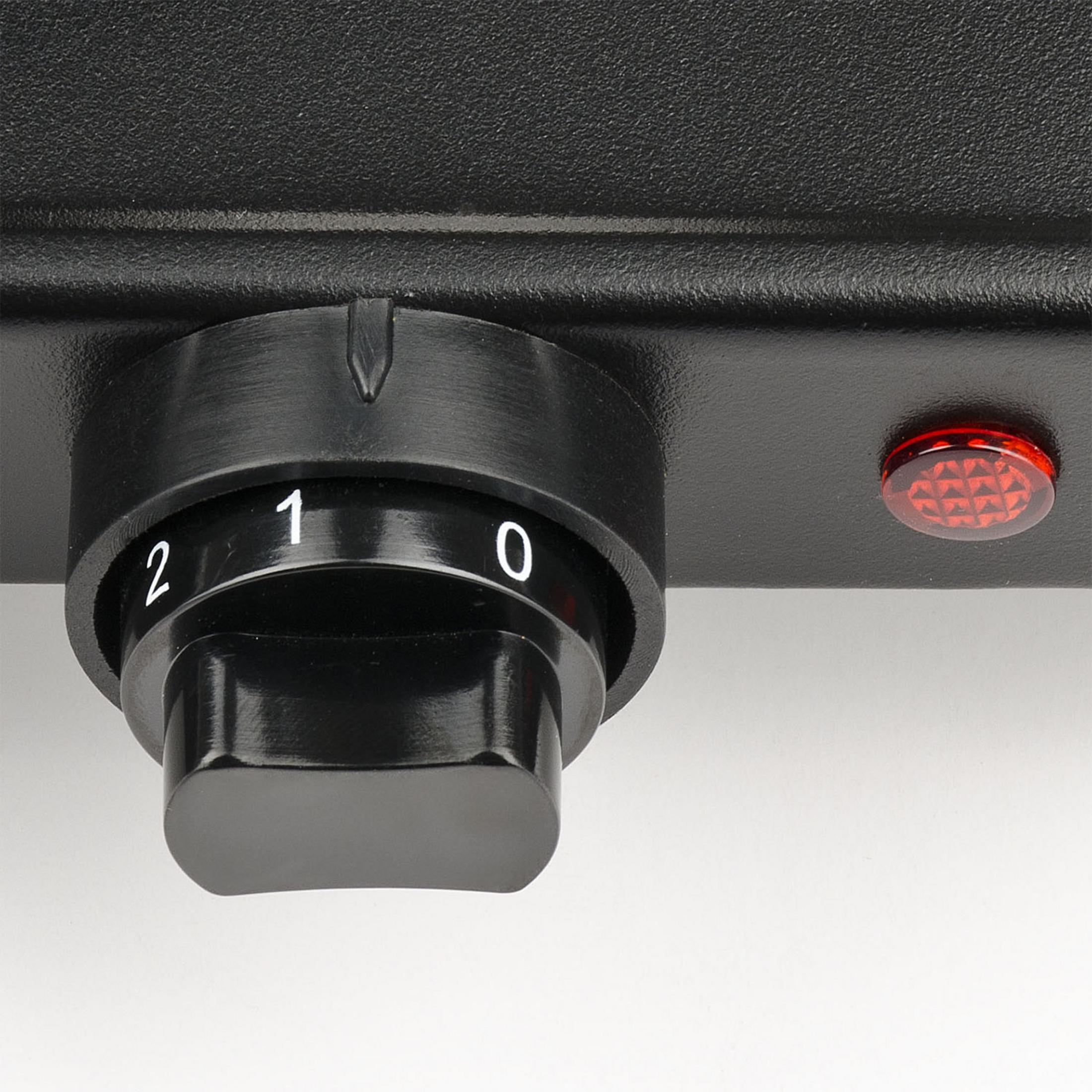 Czarny pokrętło z cyframi 0, 1, 2 i czerwoną lampką kontrolną.