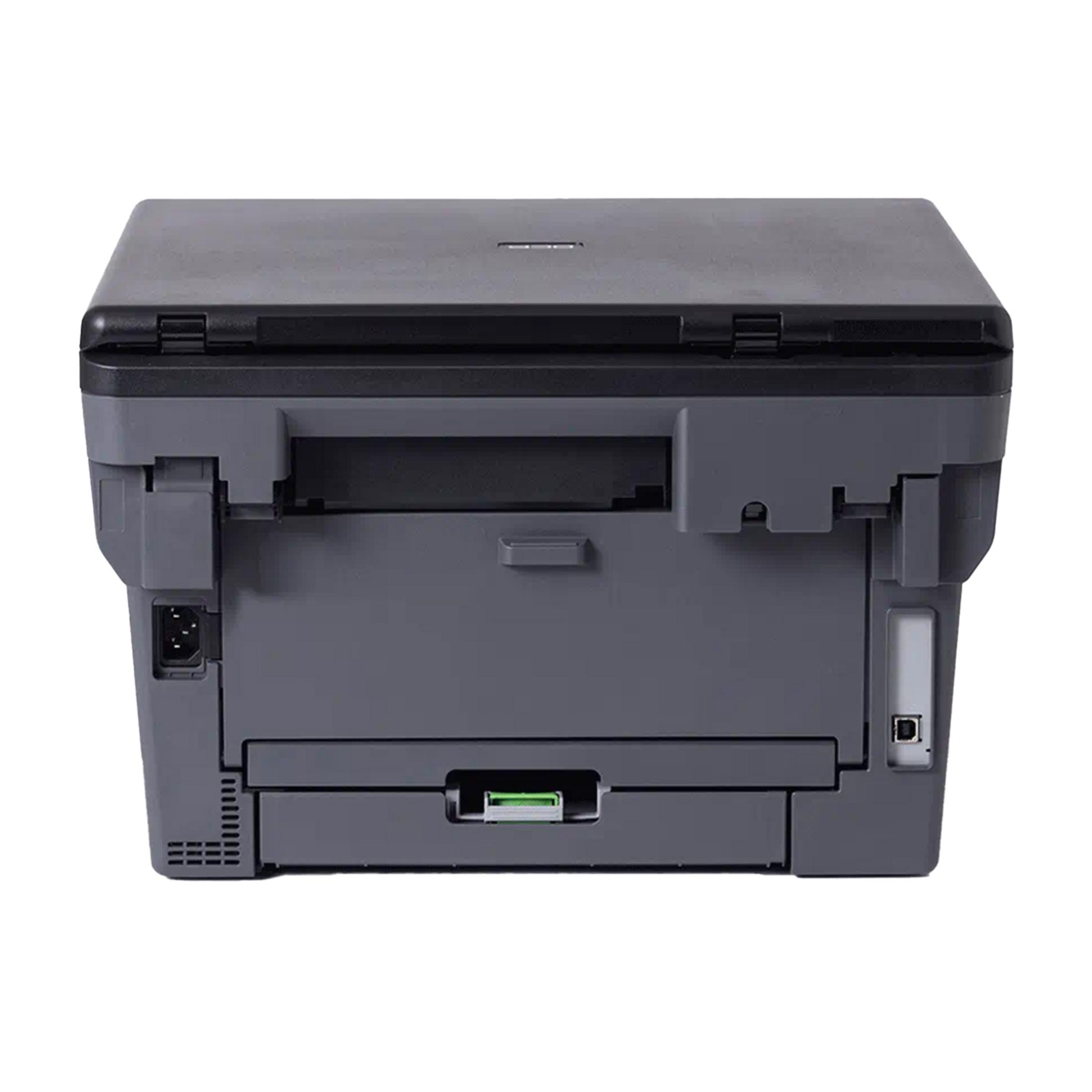 Tył szarej drukarki z portami i otworami wentylacyjnymi.