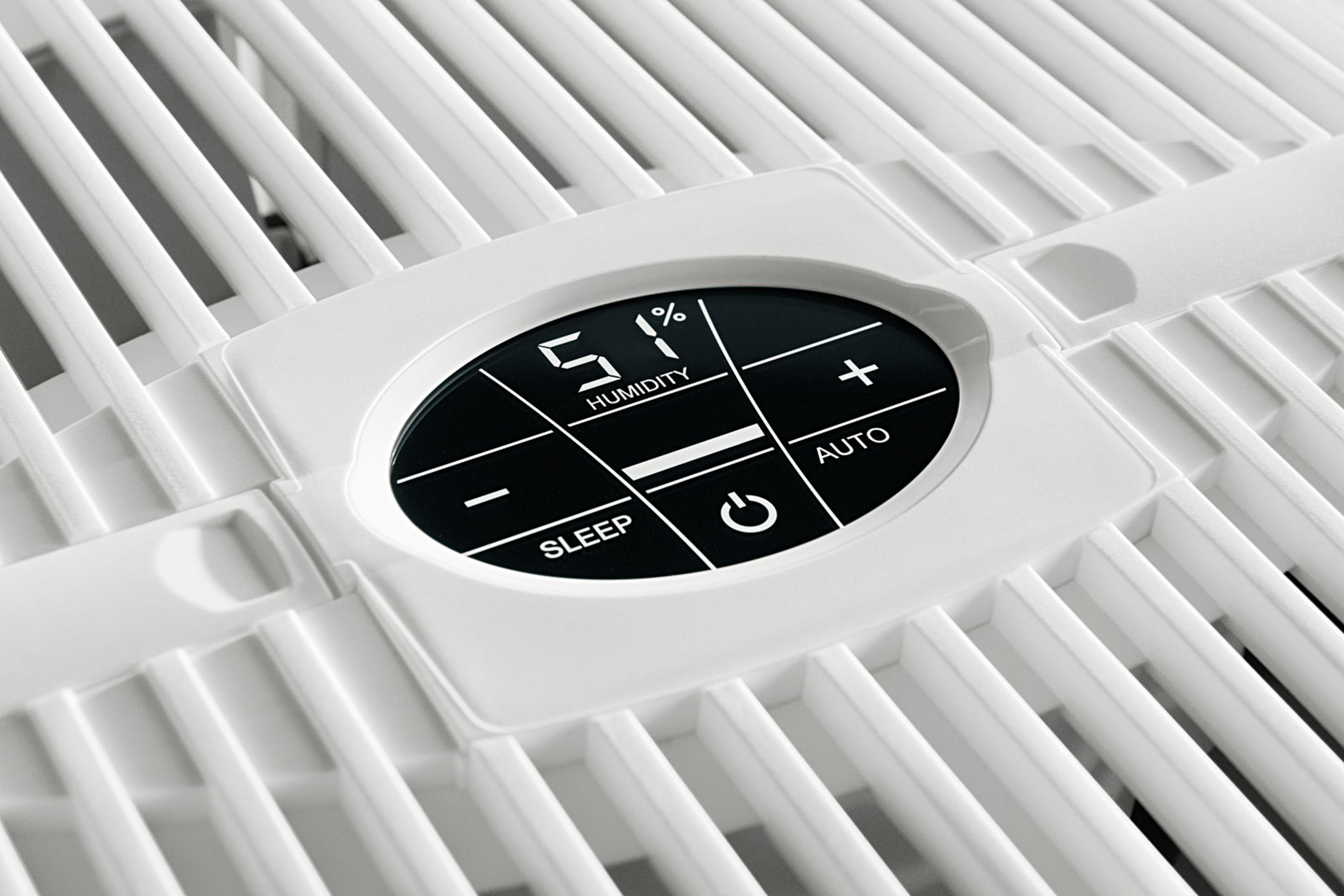 Close-up of a white grille with a black digital display showing 51% humidity.