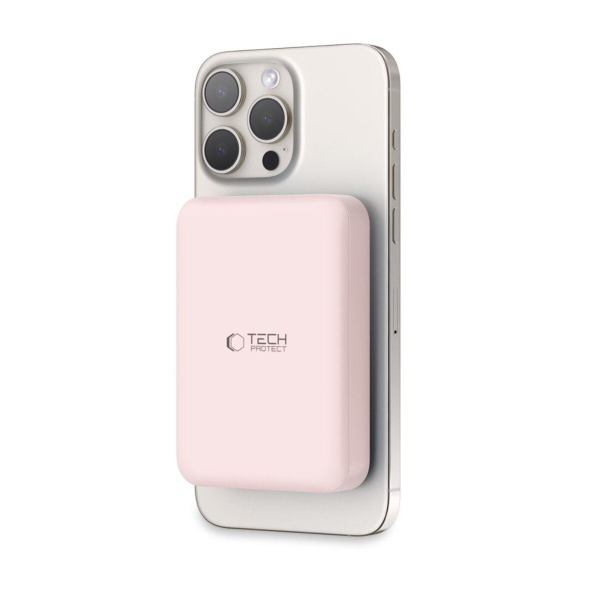 Ein rosafarbenes Powerbank haftet an einem silbernen Smartphone mit drei Kameras.