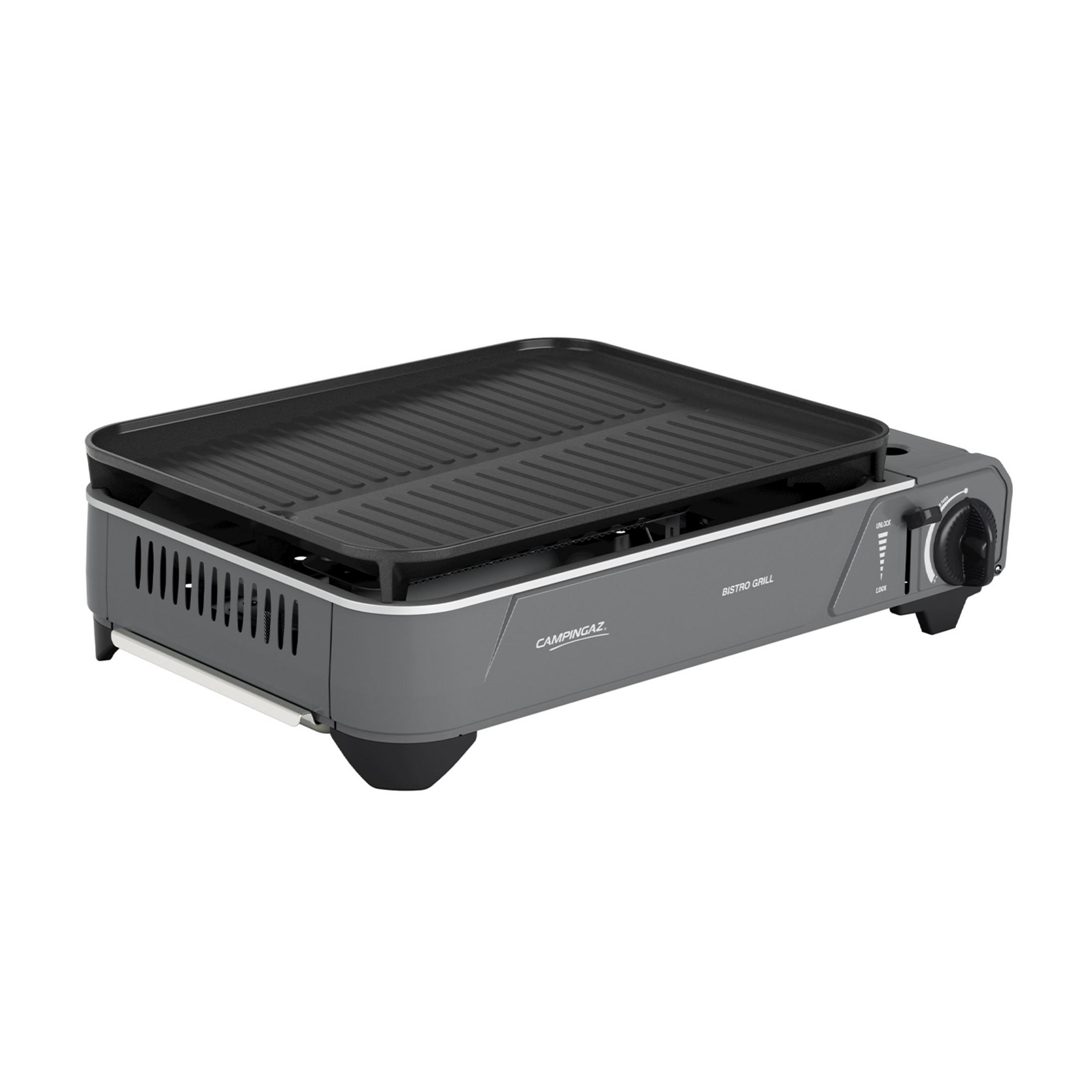 Szara grill Campingaz Bistro z żebrowaną płytą i pokrętłem.