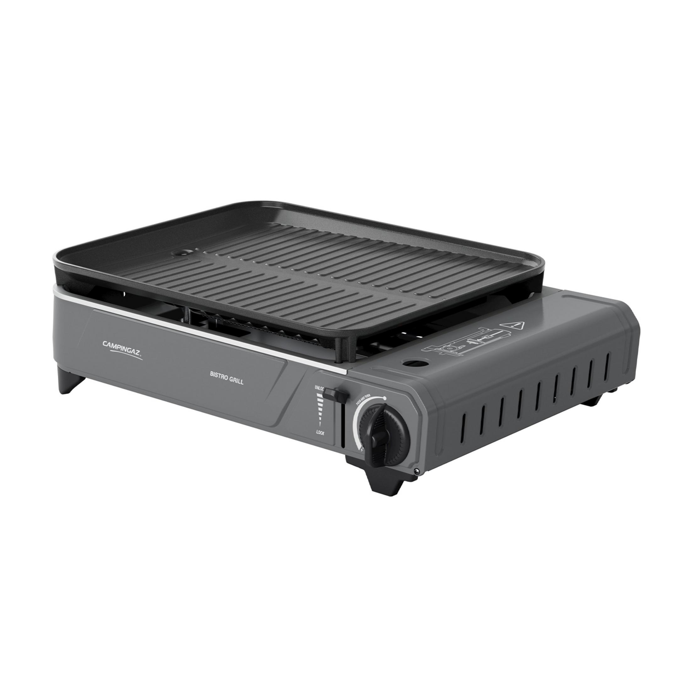 Szary grill kempingowy z żebrowaną płytą grillową i pokrętłami.