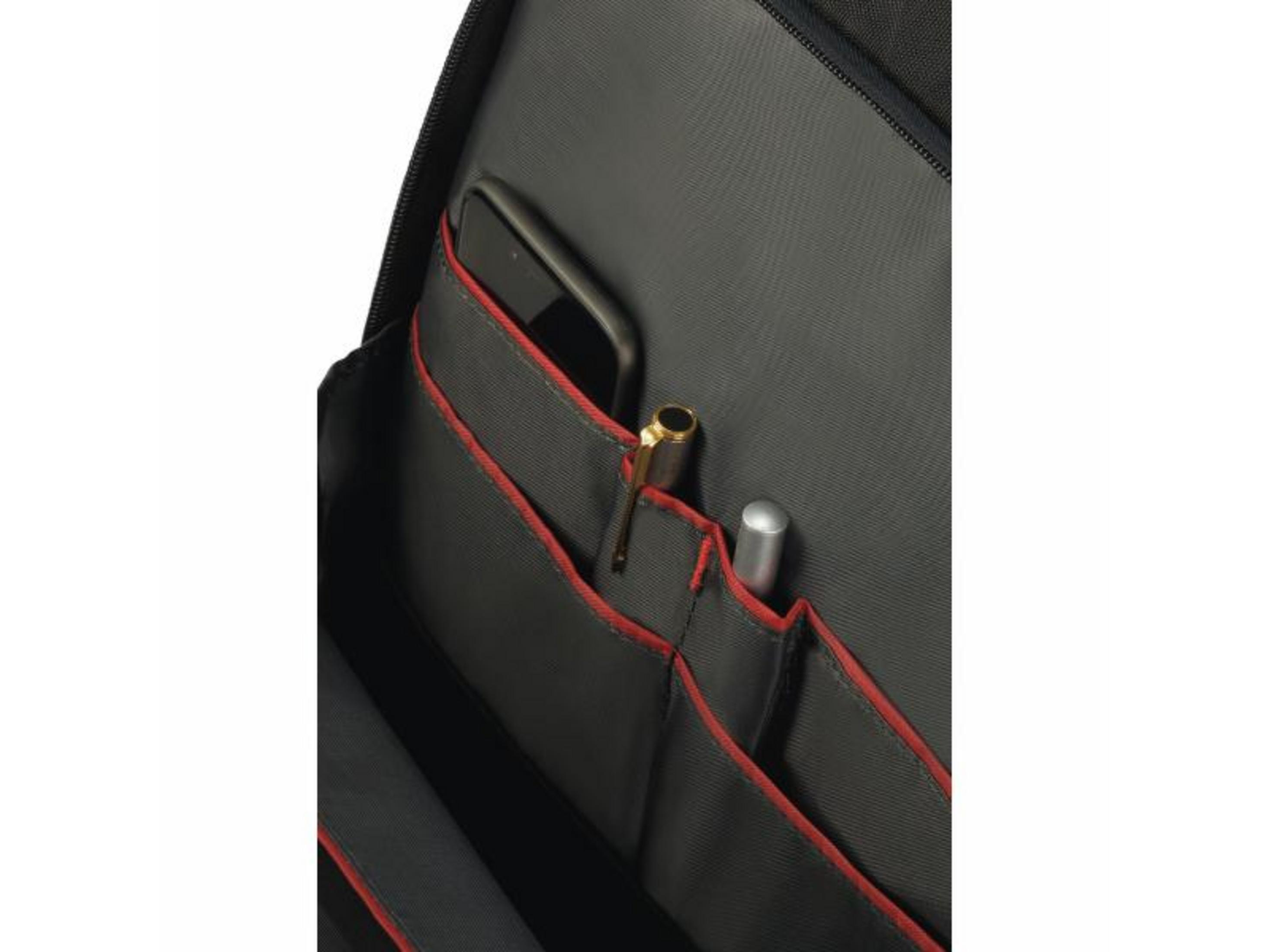 Uno smartphone e penne in tasche organizer con profili rossi.