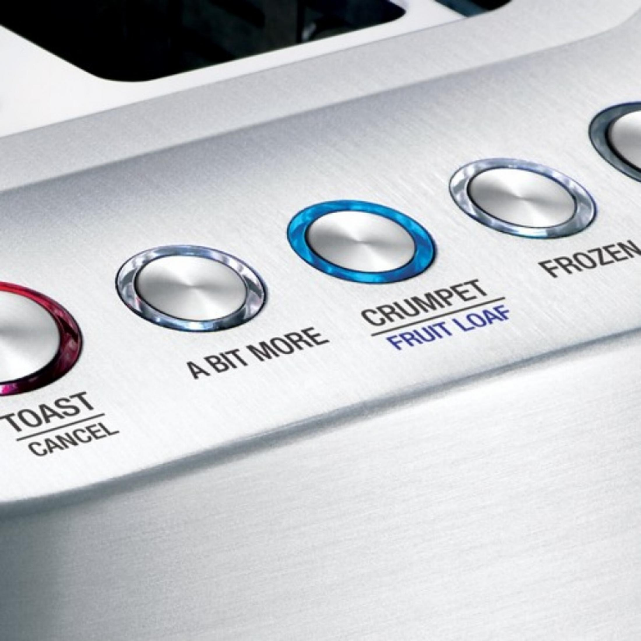 Grille-pain élégant avec boutons : Toast, Un peu plus, Crumpet, Pain aux fruits, Surgelé, Annuler.