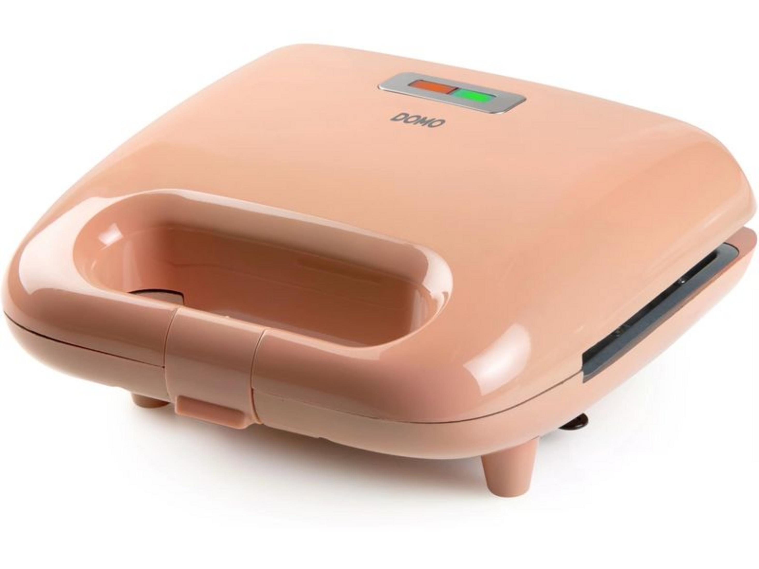 Un sandwich maker color pesca con logo DOMO e spie luminose.