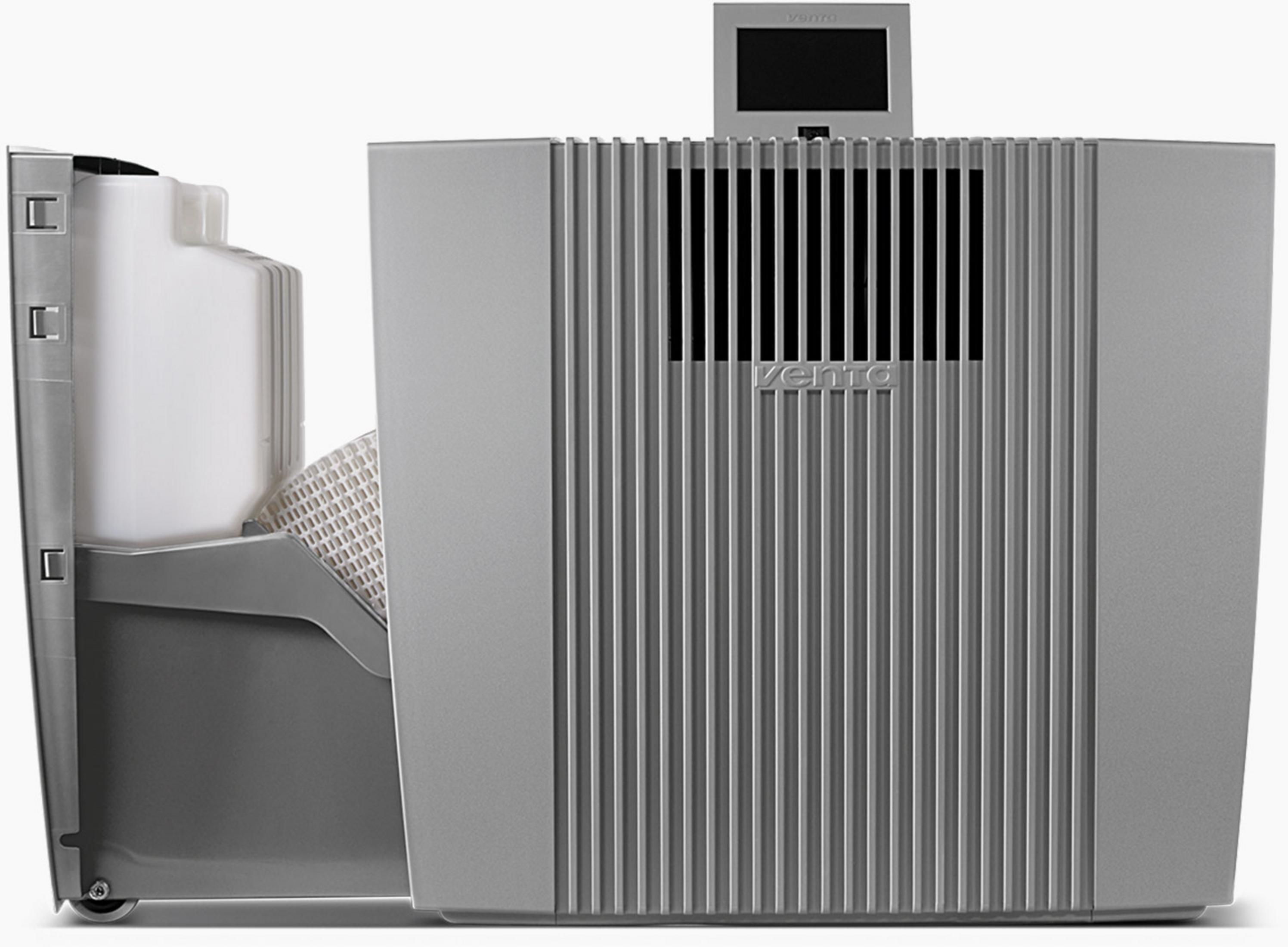Un humidificateur argenté avec réservoir d'eau et écran.