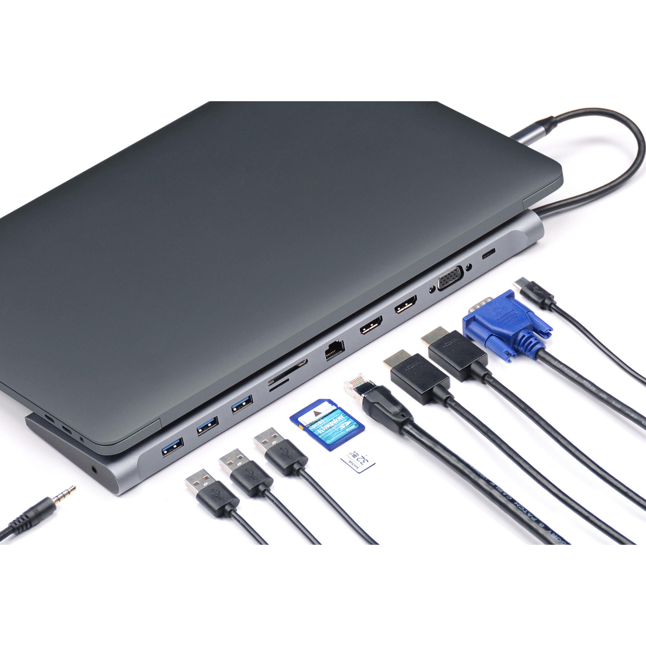 Ein graues Laptop-Dock mit vielen Anschlüssen und Kabeln.