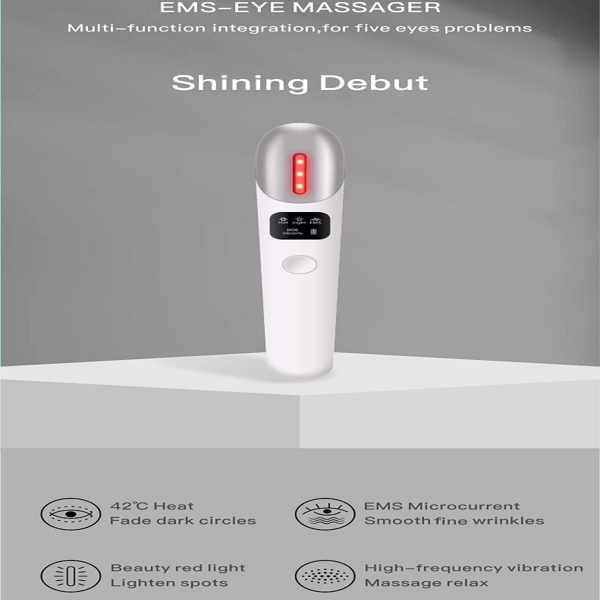 Un masajeador de ojos EMS blanco con luz roja y pantalla LCD.