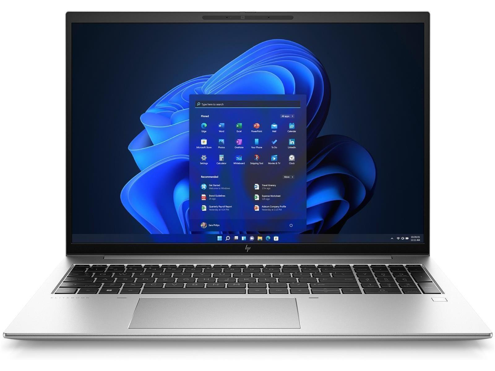 Ein silberner Laptop mit einem dunklen Hintergrund und einem blauen Fenster-Startmenü.