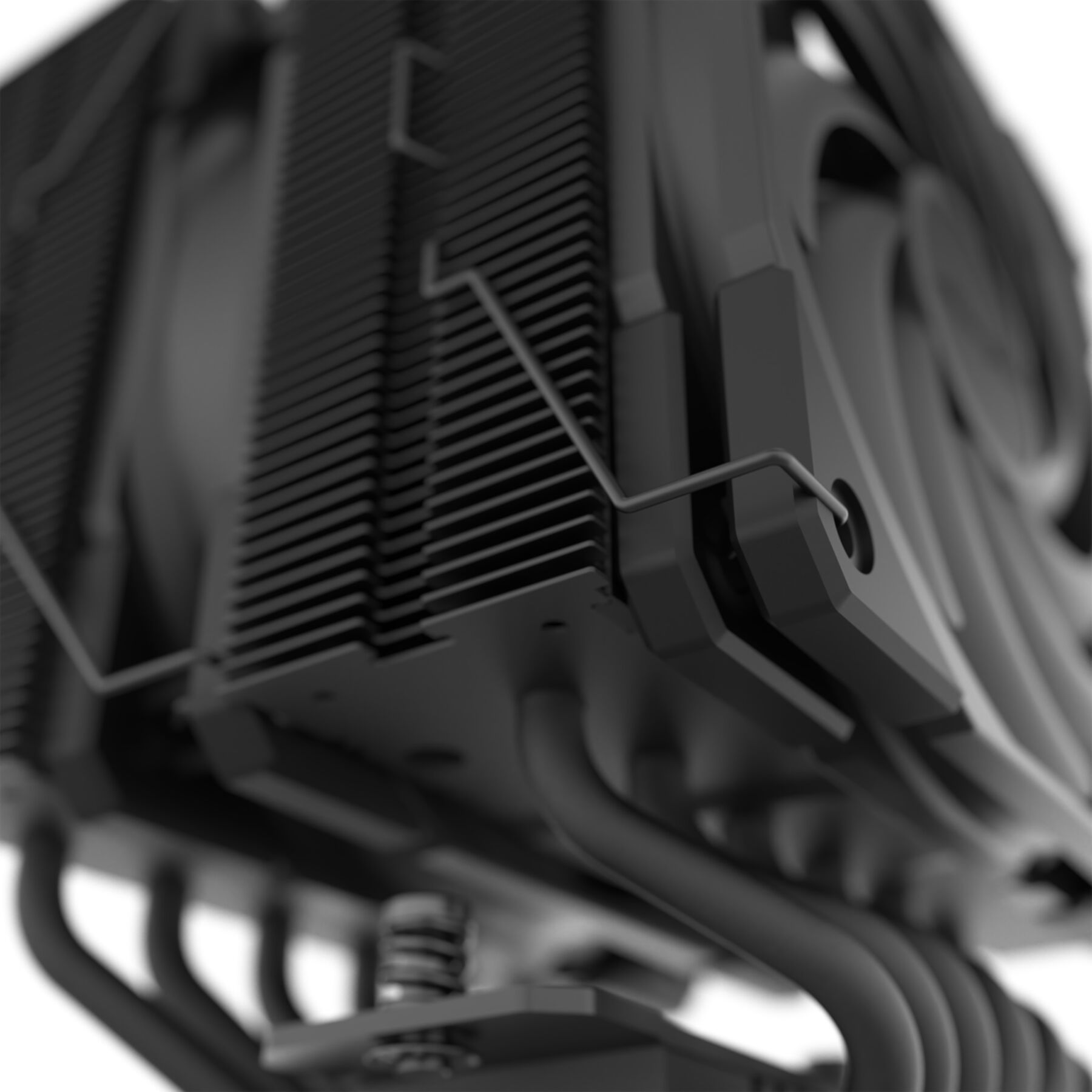 A black CPU cooler with fins and copper tubes on a white background.