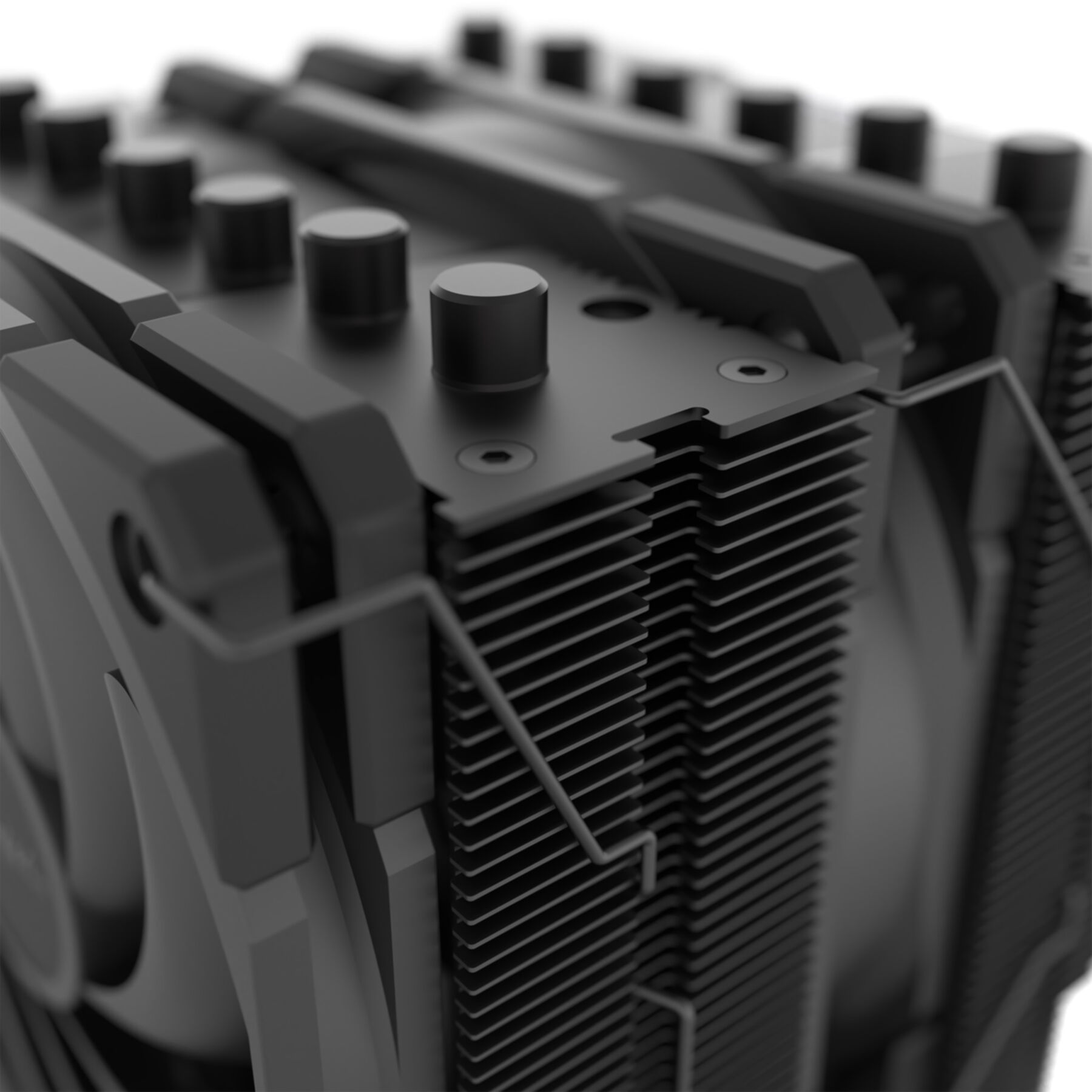 A black CPU cooler with fins and visible screws.