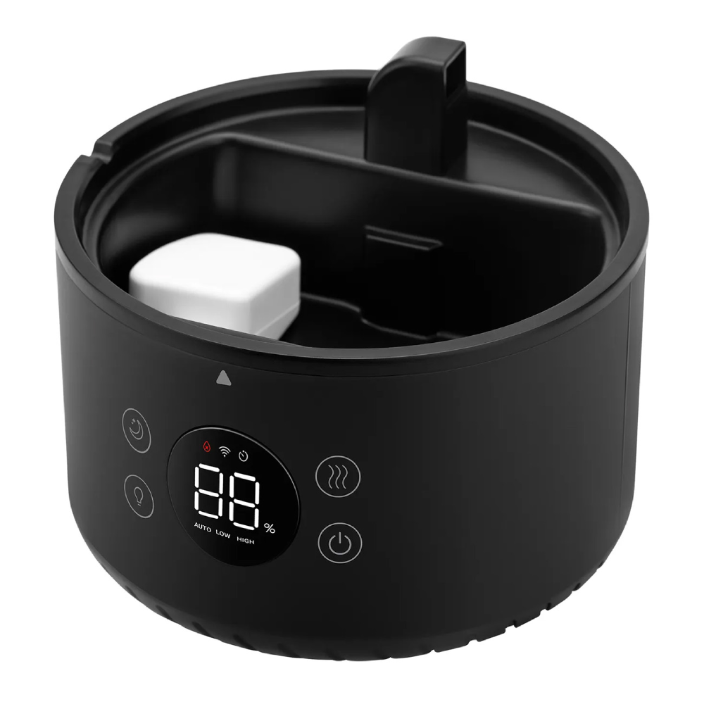 Czarny nawilżacz z cyfrowym wyświetlaczem i białym blokiem w środku.