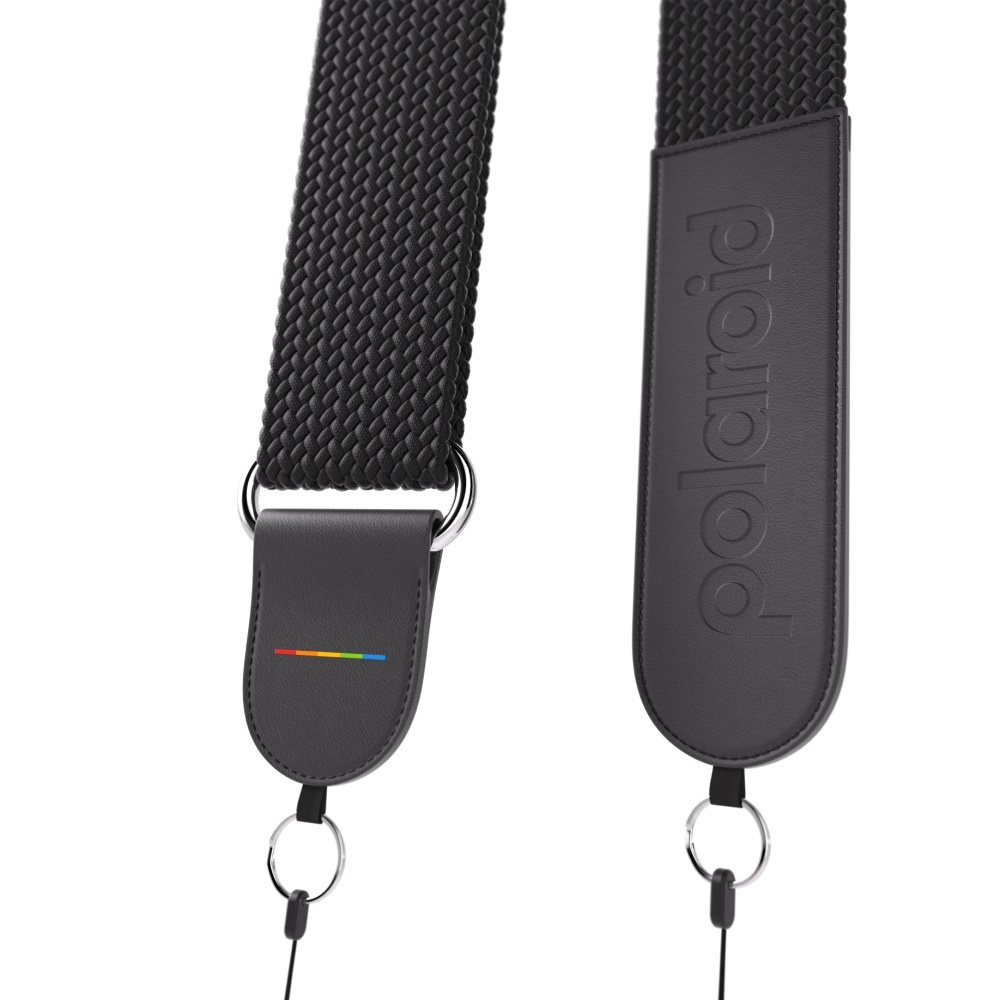 Schwarzes Kameraband mit Polaroid-Logo und Regenbogenstreifen.