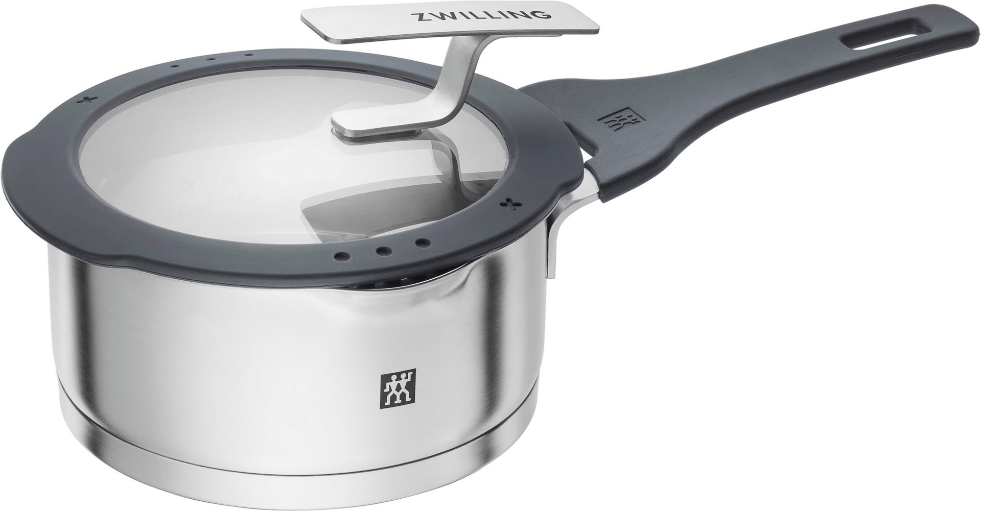 Stalowa patelnia z szklaną pokrywką i czarną rączką, marka Zwilling.
