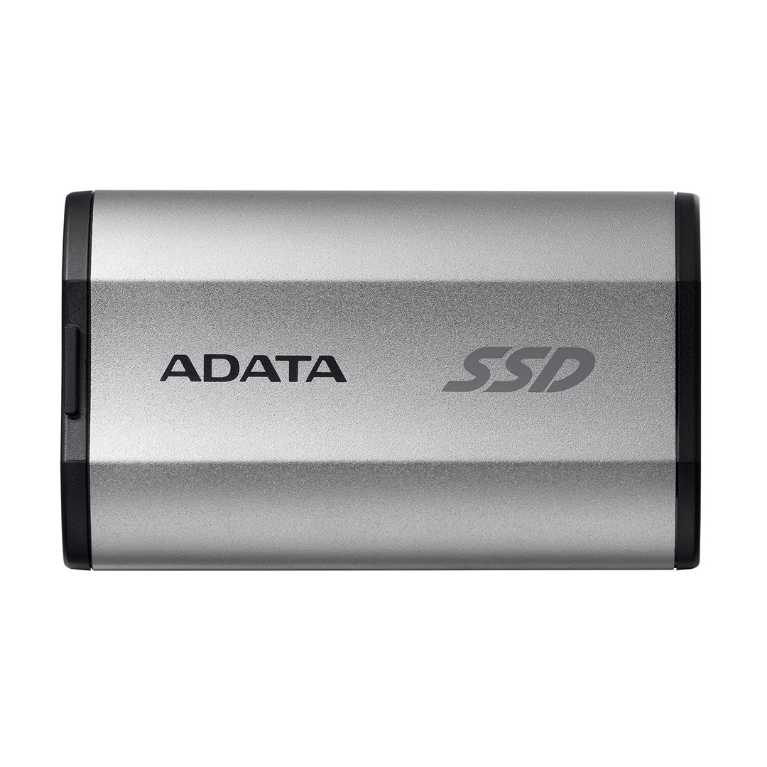 Srebrny dysk SSD ADATA z czarną ramką, na białym tle.