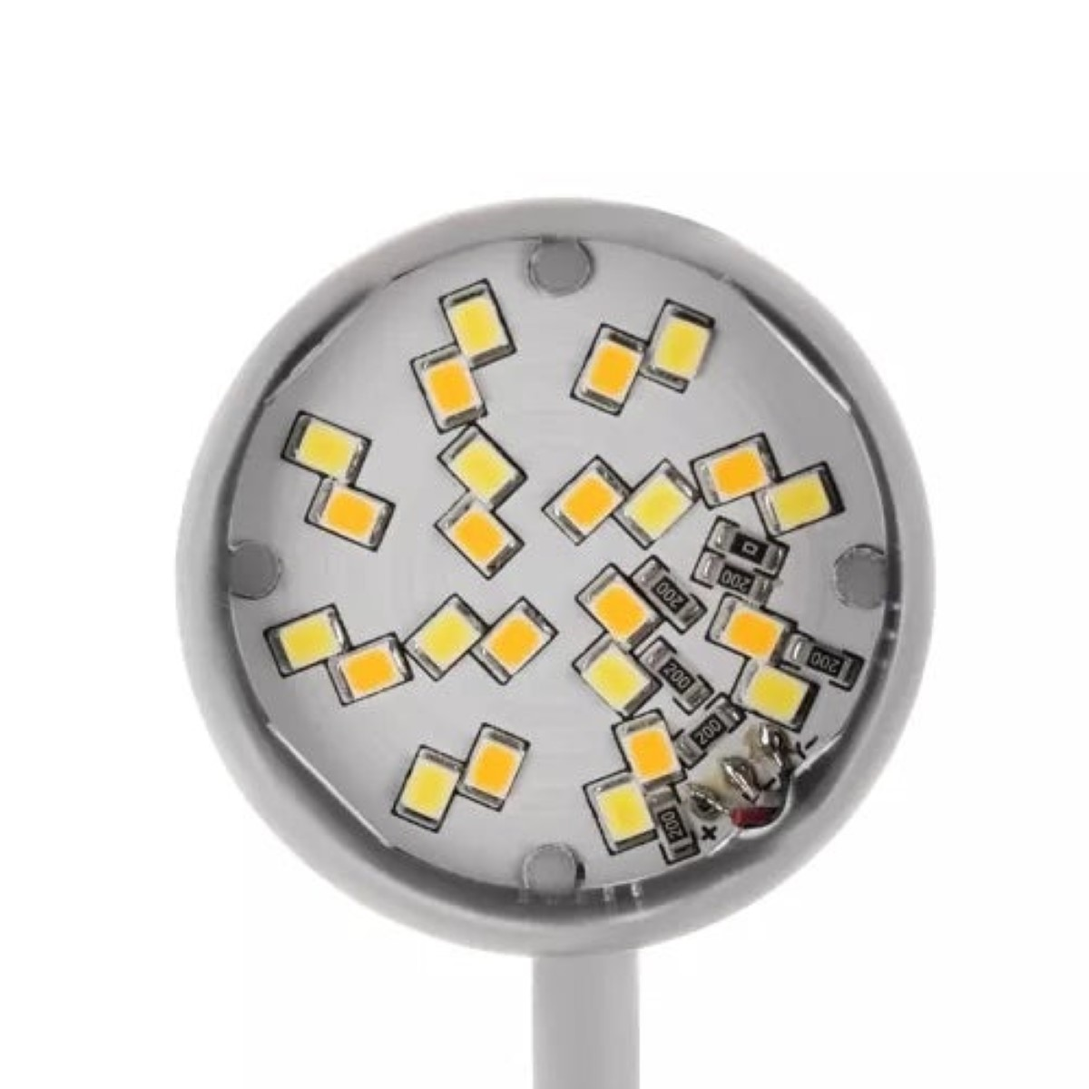 Una placa LED redonda con LEDs amarillos y blancos y resistencias.