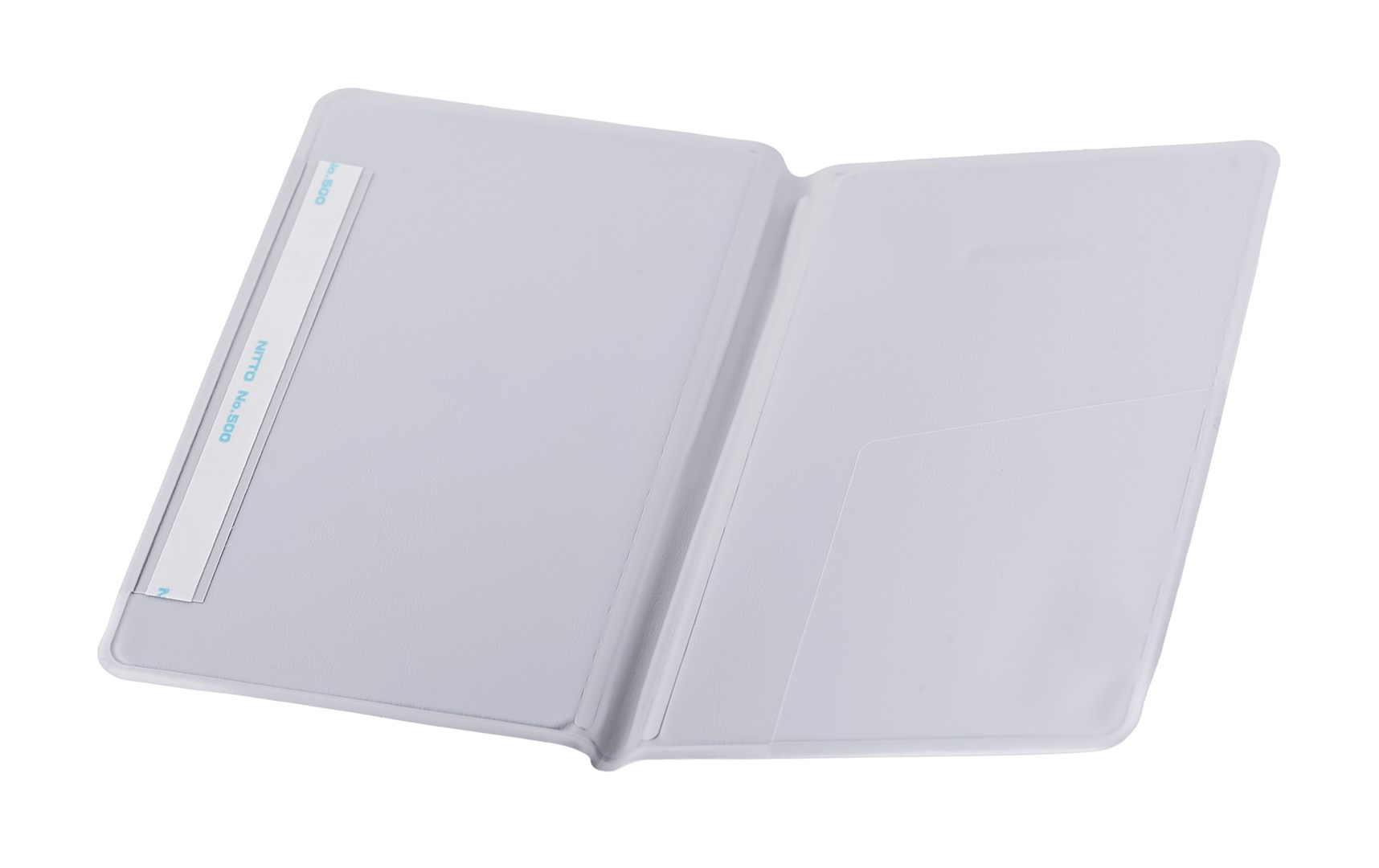 Otwarty, jasnoszary notatnik z paskiem taśmy po lewej stronie.