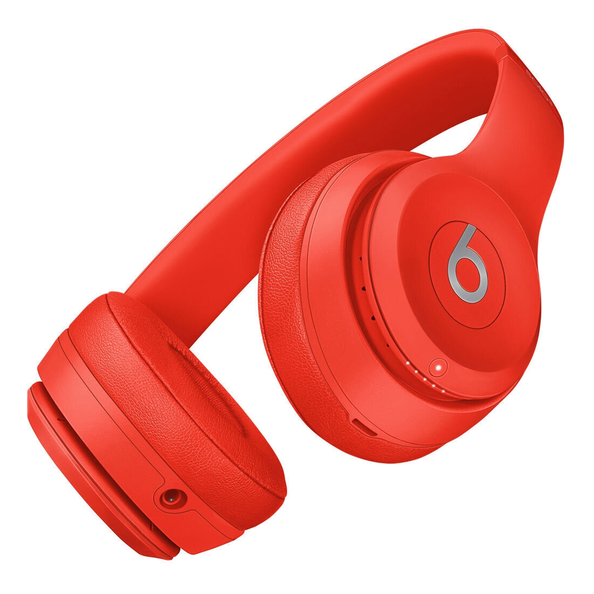 Cuffie rosse con logo Beats su sfondo bianco.