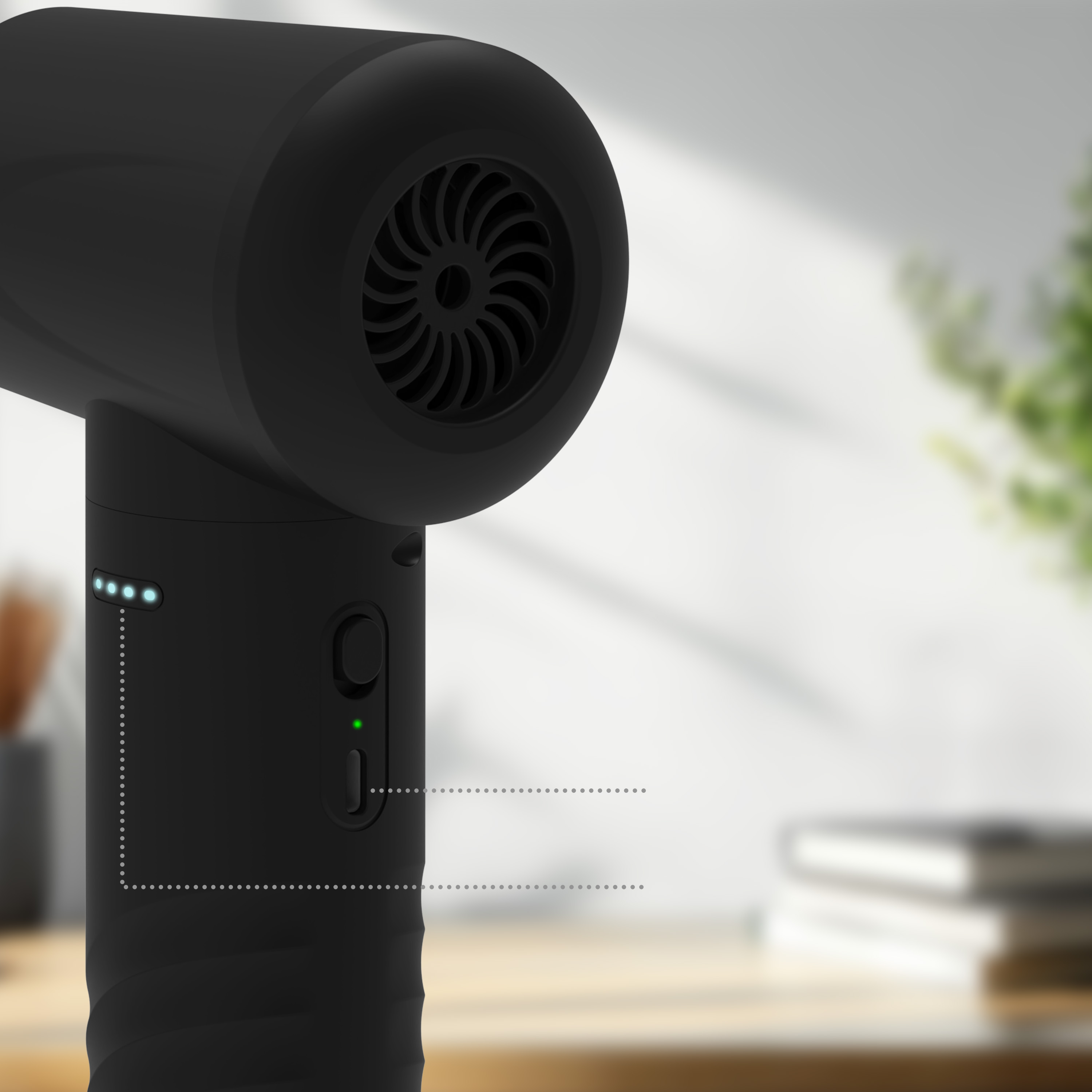 A black hairdryer with blue and green lights on a wooden table.