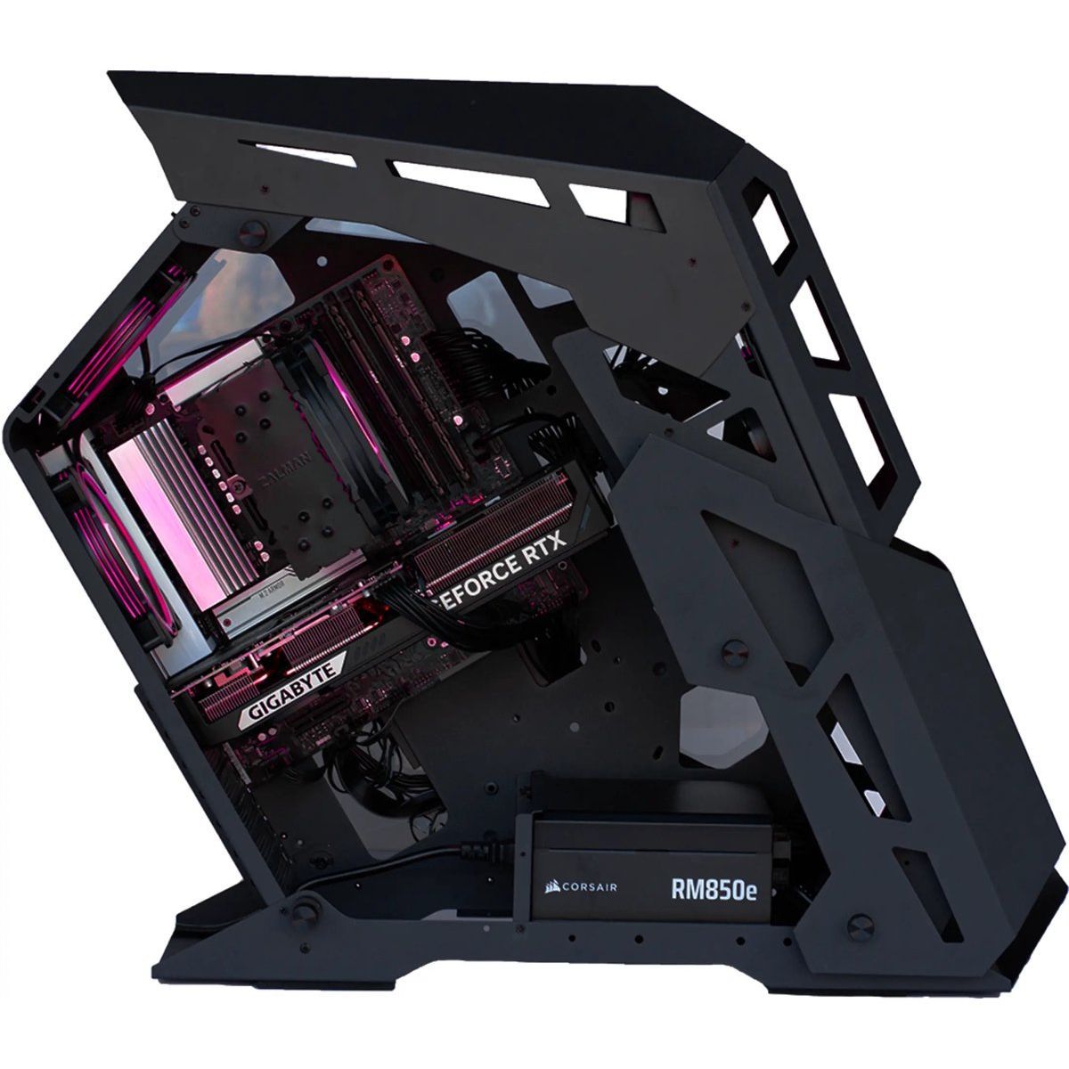 A black, open-design PC case showing a graphics card, motherboard, and power supply unit.
