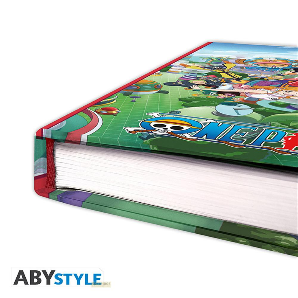 Ein Buch mit einem bunten One Piece Design, das Charaktere und das Logo zeigt.