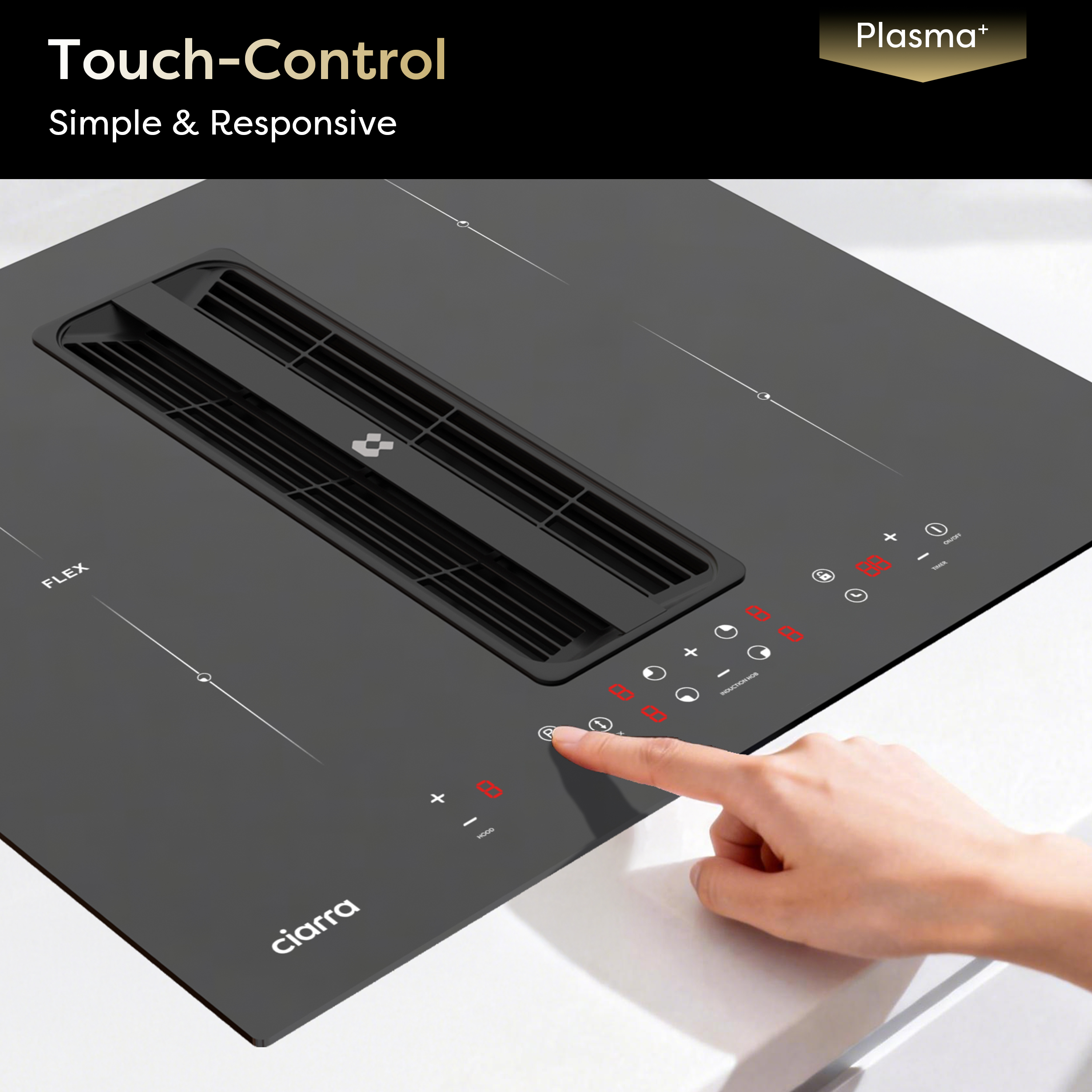 A hand touching a black induction cooktop with integrated ventilation, showing red illuminated controls and text.